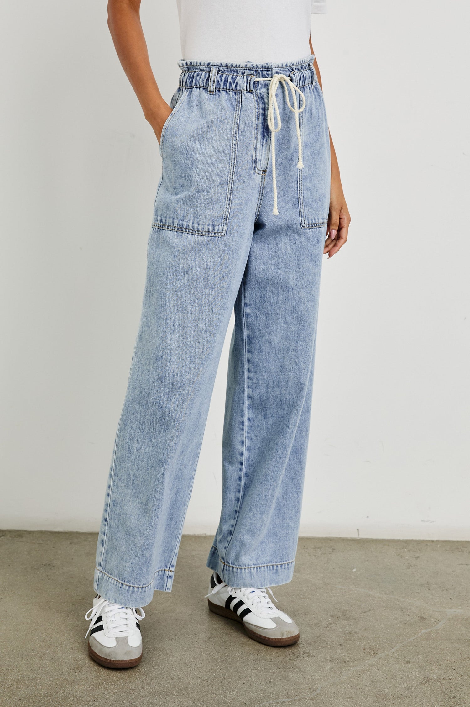 Ryan high rise linen pant with shirred waist and drawstring in light wash Faded Indigo- front view on model