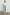 Ryan high rise linen pant with shirred waist and drawstring in light wash Faded Indigo- full body front view on model