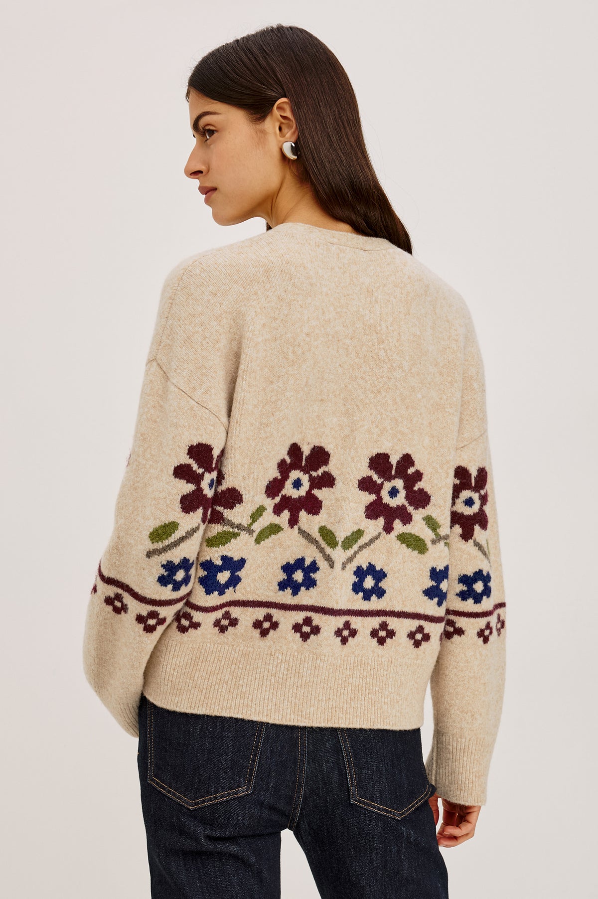 Saffron Cardigan in Wool Blend Knit With Relaxed Slightly Oversized Fit, Front Buttons, and Ribbed Trim in Oat Floral Colorway - Upper Body Back View Featured on Model.