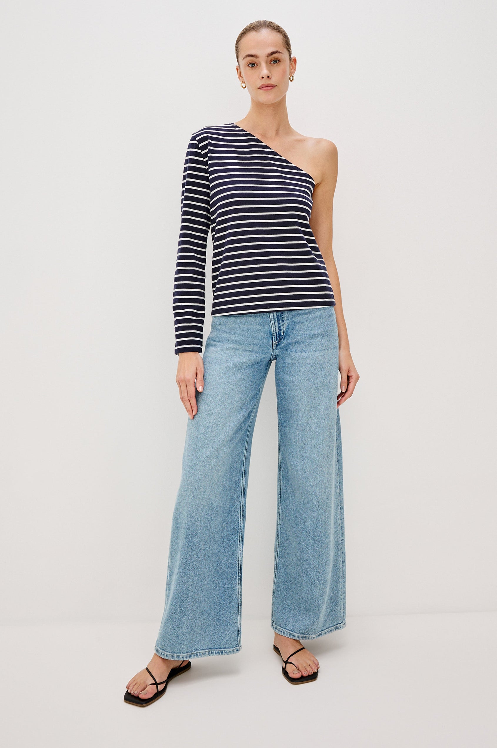 Sara One Shoulder Shirt with Long Sleeve in Blue/White Nautical Stripe Colorway. Full Body Front View Shown on Model.