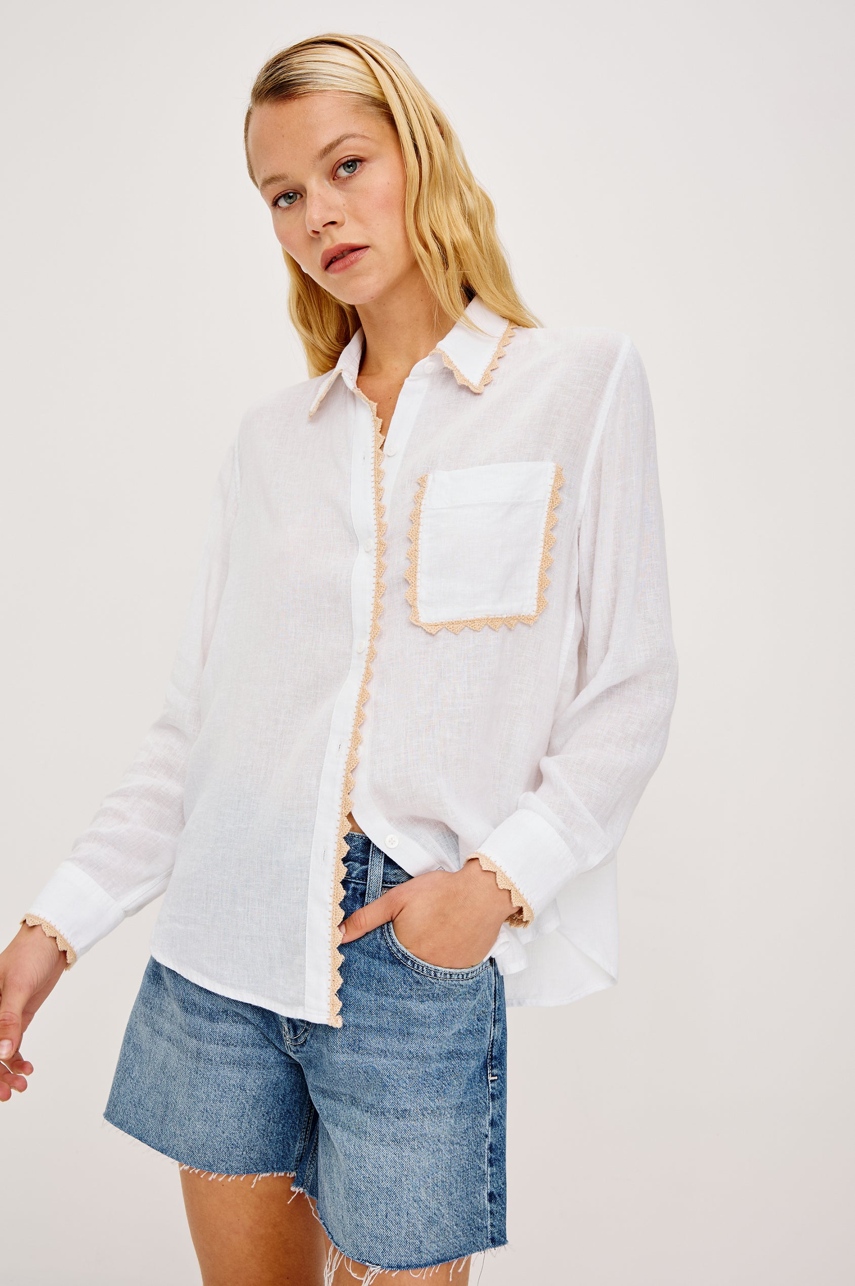 Saya Button-Up Shirt in Luxe Linen With Collar Single Chest Patch Pocket Long Sleeves Relaxed Fit and Crochet Embroidered Detailing in White Colorway - Upper Body Front View Featured on Model