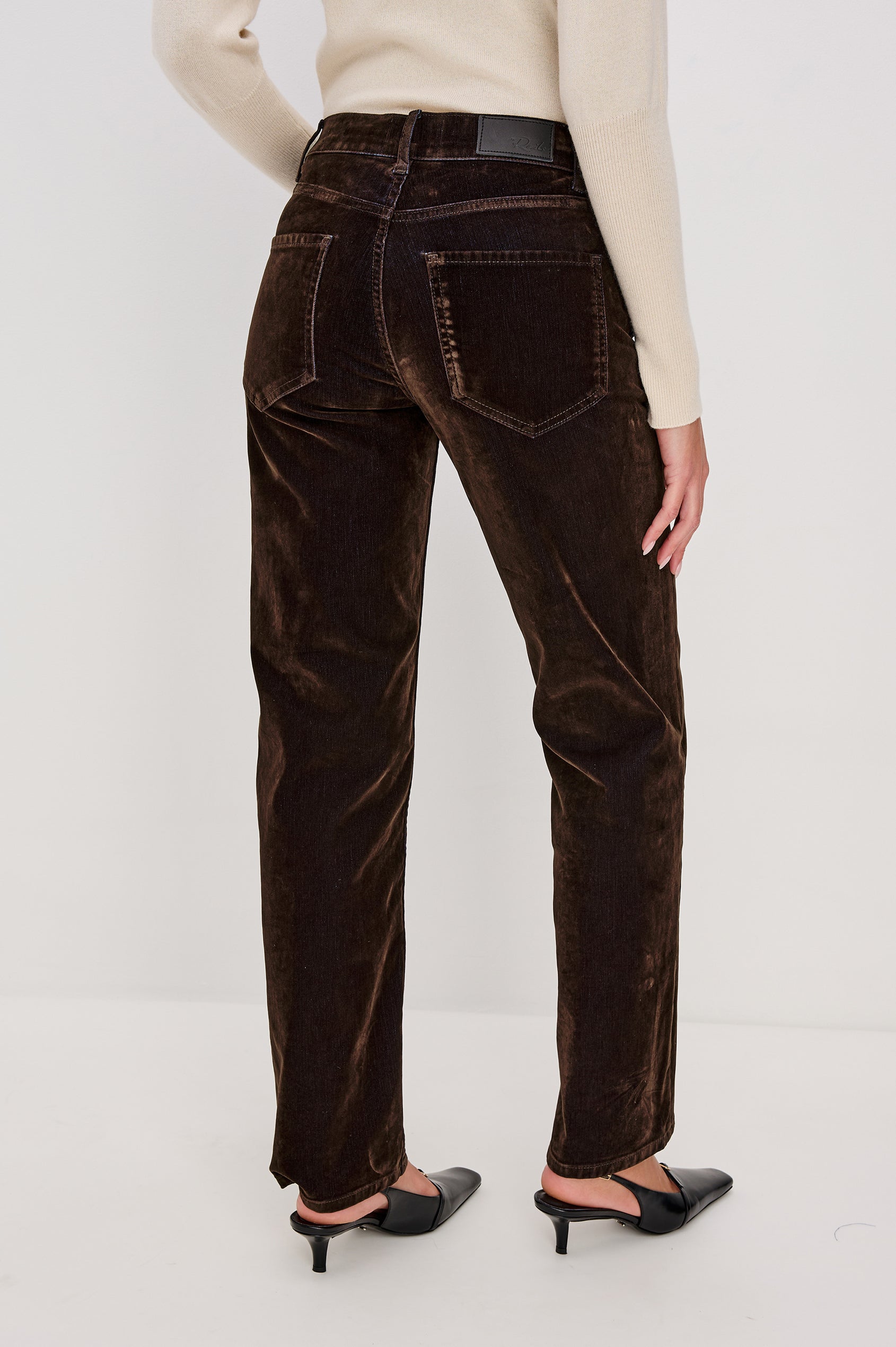 Sepulveda is a mid-rise 5-pocket, zip-front jean with a relaxed straight leg in chocolate-flocked denim in Chocolate Flocking colorway. Back view featured on model.