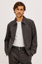 Shael Jacket in Heathered Stretch Ponte With Point Collar, Zip Front, and Double Welt Pockets in Umber Colorway - Upper Body Front View Featured on Model