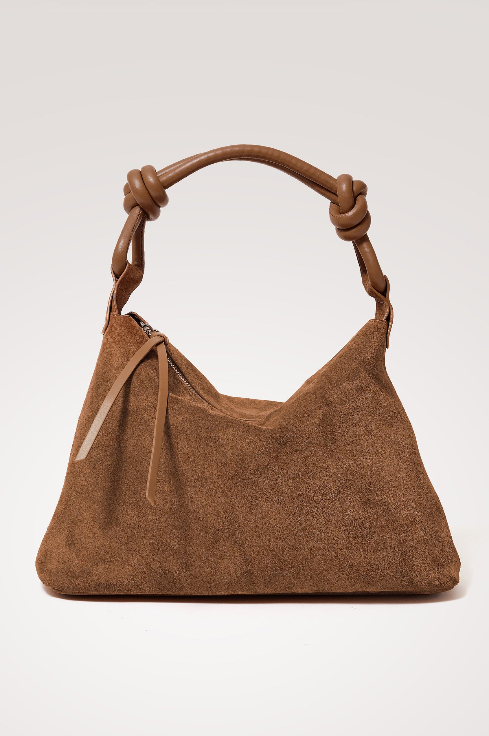 Siena Hobo Bag in Suede With Knotted Top Strap, Zip Closure With Fringe Tassel Pull, Microsuede Lining, Snap-Button Slip Pocket and Foil Logo Stamp at Interior in Camel Suede Colorway - Front Product View Featured