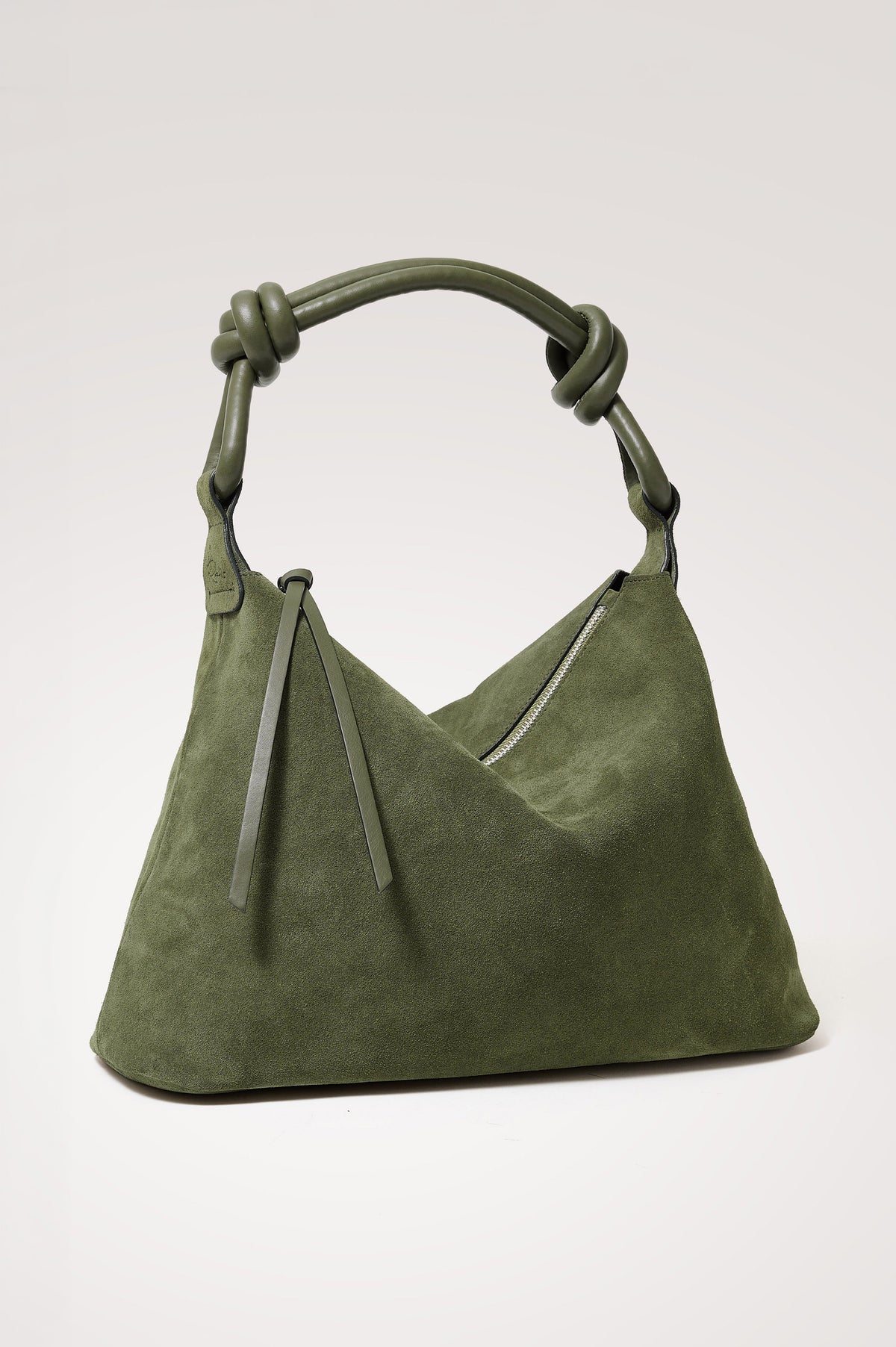 Siena Hobo Bag in Suede With Knotted Top Strap, Zip Closure With Fringe Tassel Pull, Microsuede Lining, Snap-Button Slip Pocket and Foil Logo Stamp at Interior in Olive Suede Colorway -
