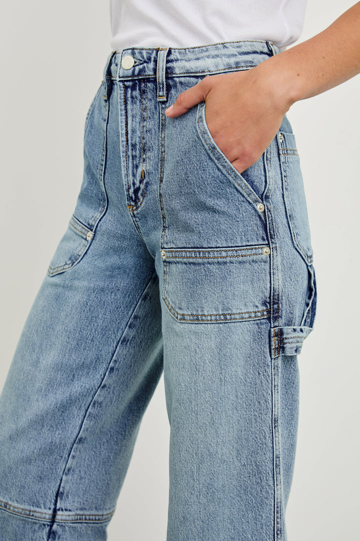 Silverado high rise wide leg crop pant with carpenter style details and contrast stitching in Blueprint - close up of details on model