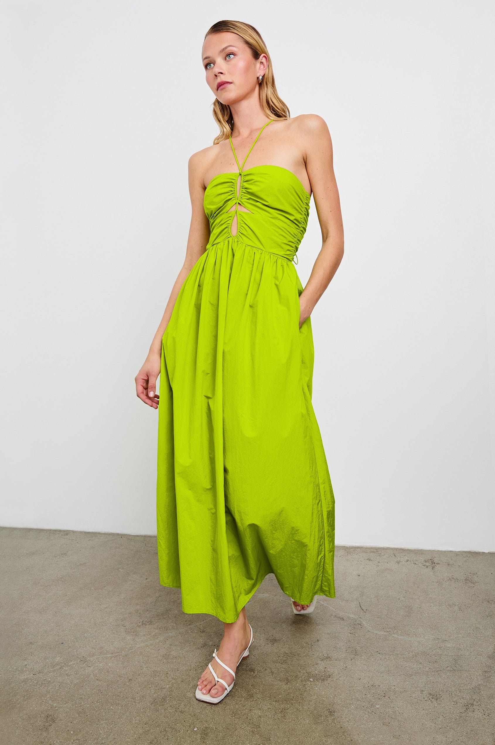 Silvia Sleeveless Maxi Dress with Spaghetti Straps with a Lower Back Tie, an Open Back, and Cutouts Along the Center of the Bodice in Banana Leaf Colorway - Front Full Body View Featured on Model