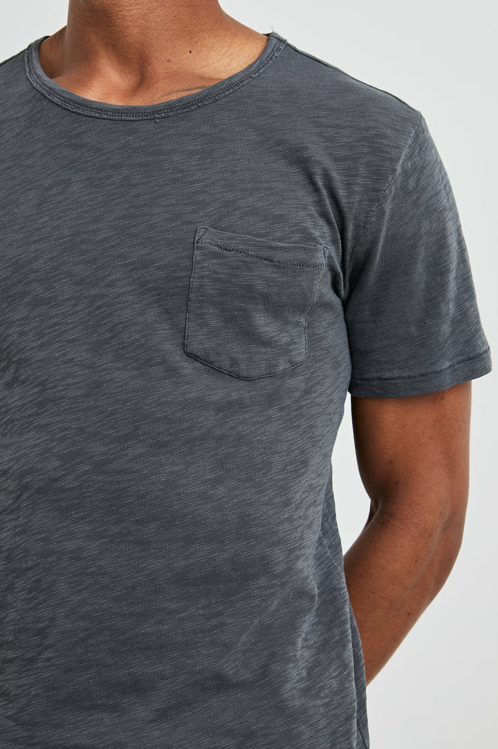 Skipper Short-Sleeve T-shirt with a Crew Neck and a Chest Patch Pocket in Faded Navy Colorway - Front View Featured on Model