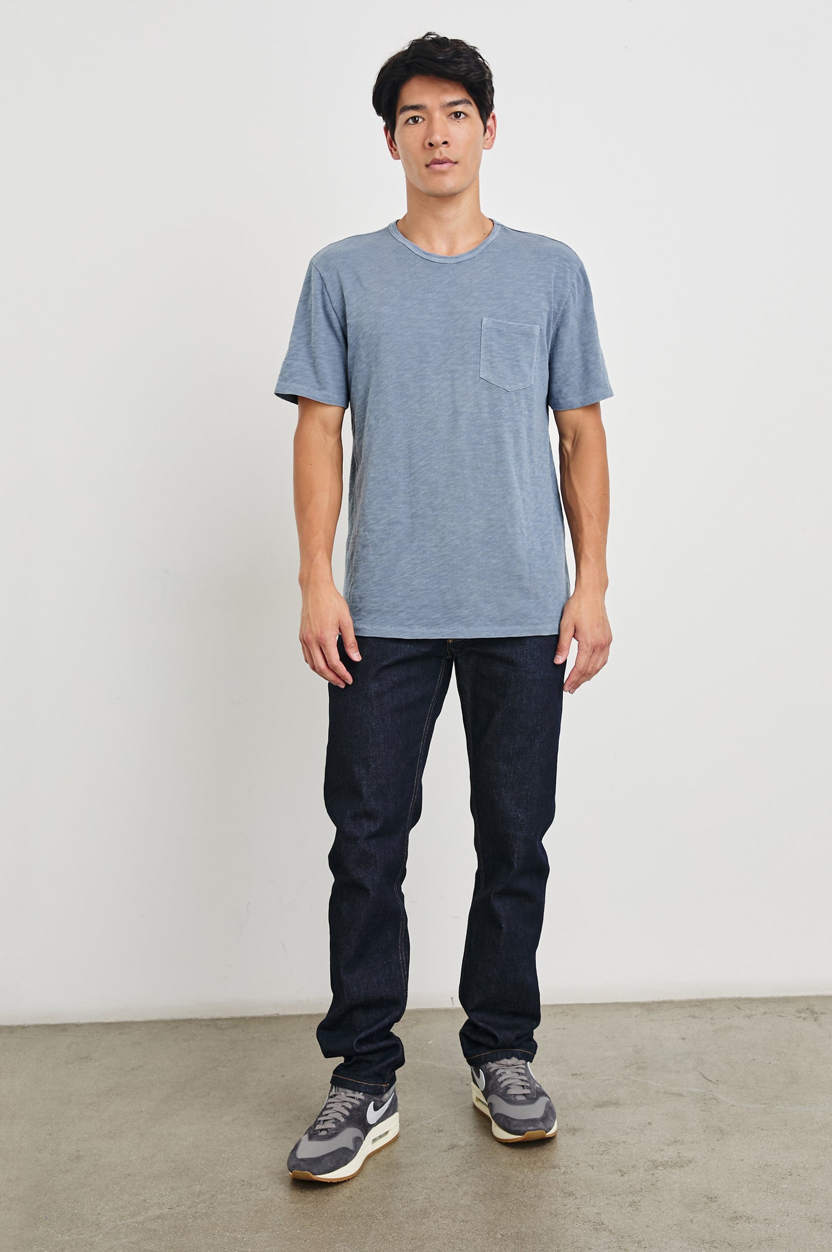 Skipper Short-Sleeve T-shirt with a Crew Neck and a Chest Patch Pocket in Steel Colorway - Front Full Body View Featured on Model
