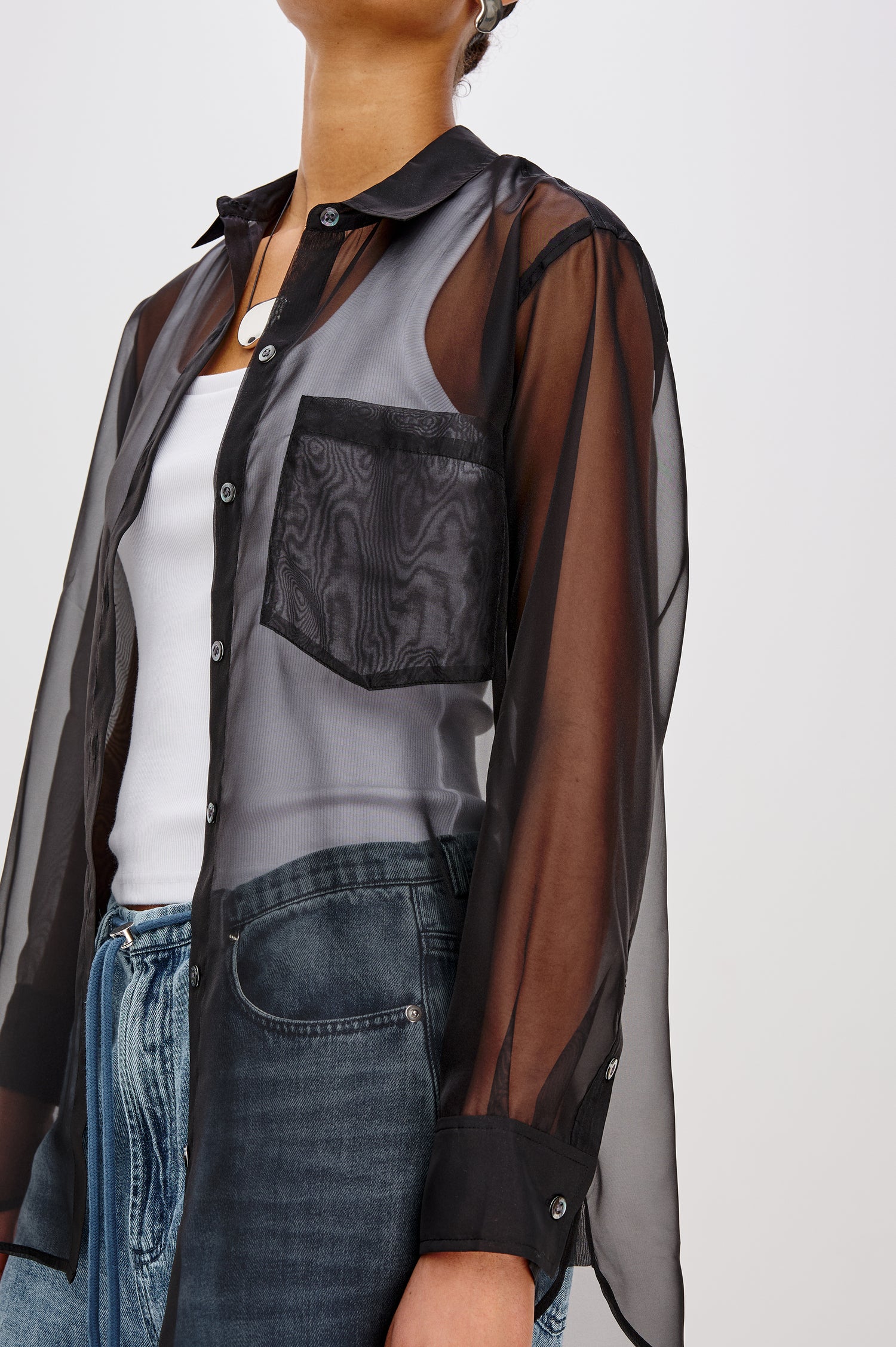 Sofiya Button-Up Shirt in Sheer Organza With Collar and Long Sleeves in Black Colorway - Mid Body Side View Featured on Model