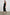 Solene Sleeveless Midi Dress with a Crew Neck and a Tie Keyhole at the Back in Black Colorway - Front Full Body View Featured on Model