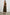 Solene Sleeveless Midi Dress with a Crew Neck and a Tie Keyhole at the Back in Dark Moss Colorway - Back Full Body View Featured on Model