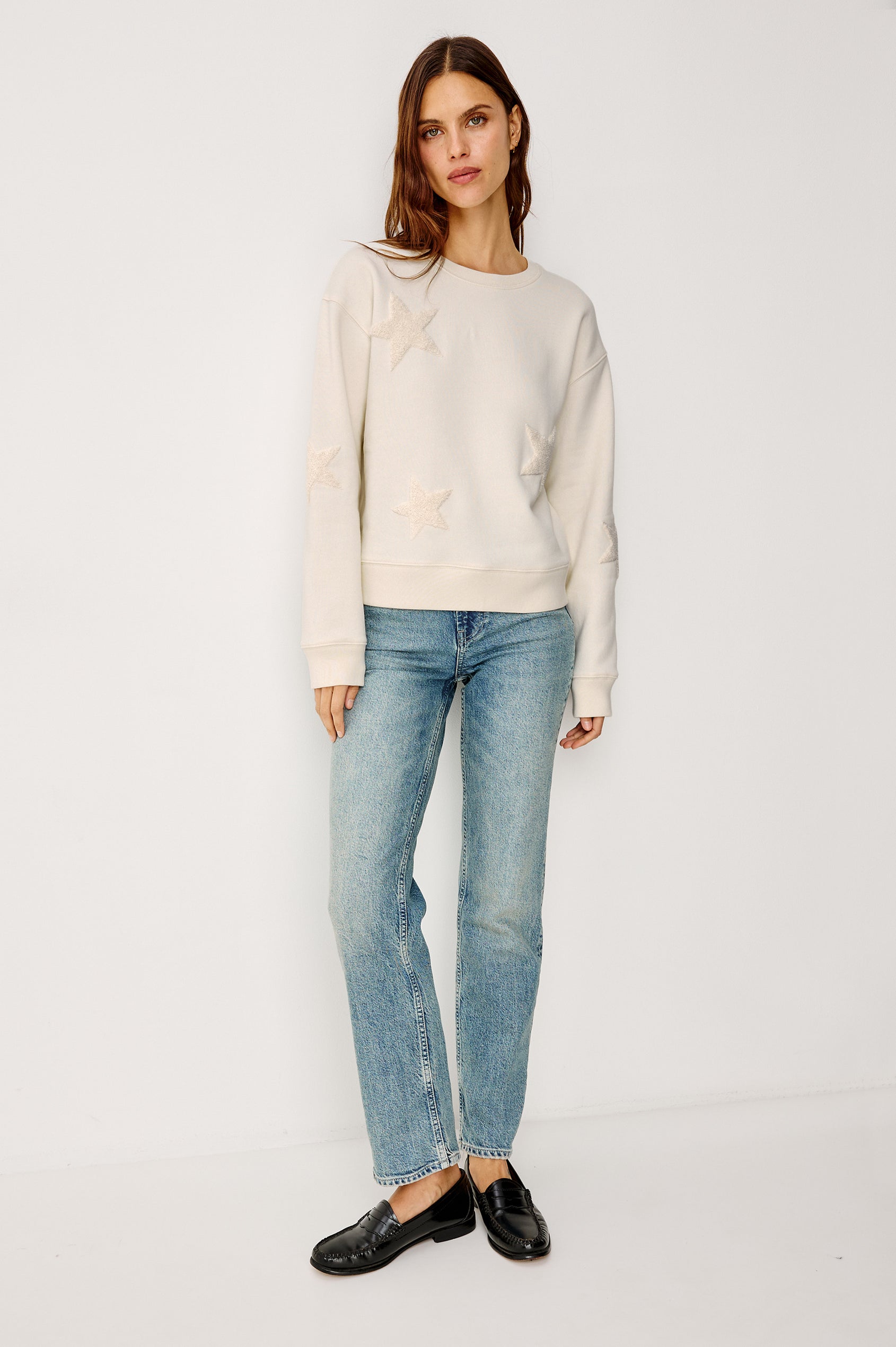 Sonia Crewneck Sweatshirt in Cotton Fleece With Flocked Stars, a Relaxed Fit, and Long Sleeves in Ivory Colorway - Full Body Front View Featured on Model