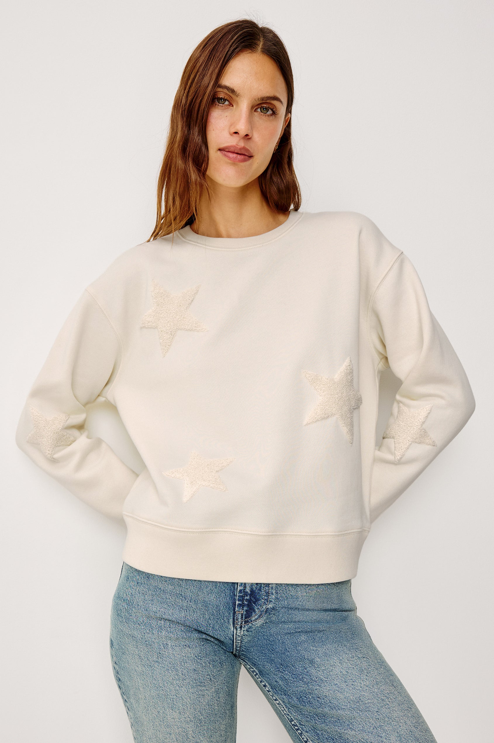 Sonia Crewneck Sweatshirt in Cotton Fleece With Flocked Stars, a Relaxed Fit, and Long Sleeves in Ivory Colorway - Upper Body Front View Featured on Model