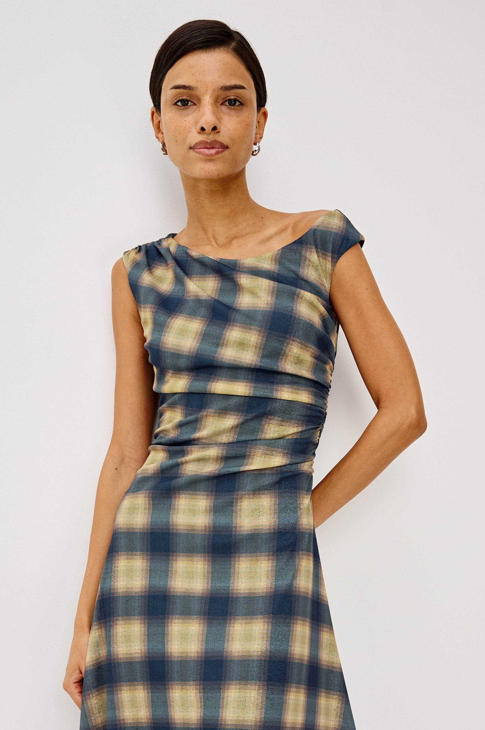 Sorra Midi Dress in Self-Lined Mesh With Asymmetrrical Neckline, Shirred Shoulder Strap, Side Waist Ruching, Bias-Cut Skirt in Navy Sage Plaid Colorway - Upper Body Front View Featured on Model