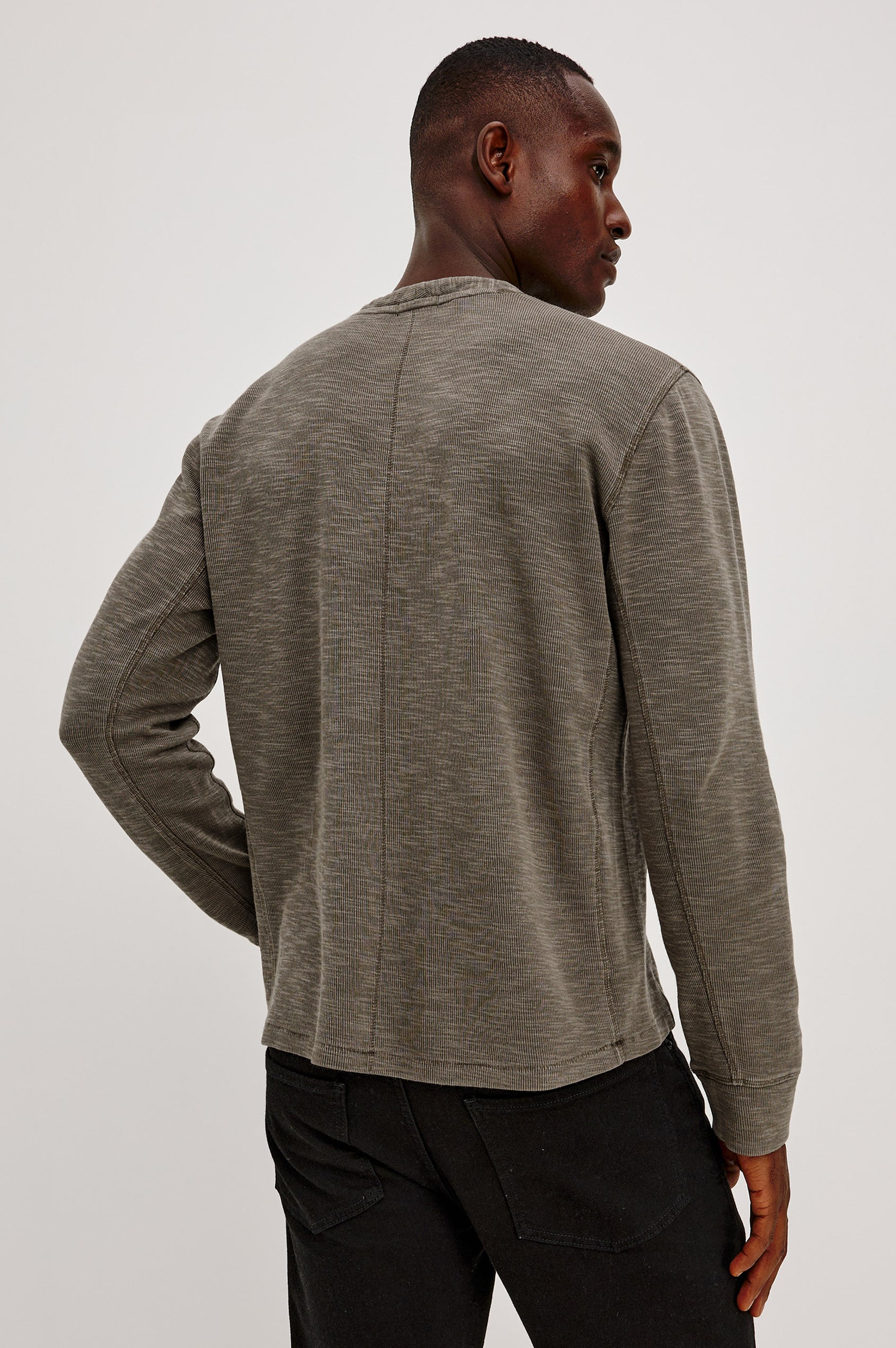 Soto Henley in Cotton French Rib Blend With 4-Button Placket, Tonal Seam Detailing, and Long Sleeves in Crossroad Colorway - Upper Body Back View Featured on Model