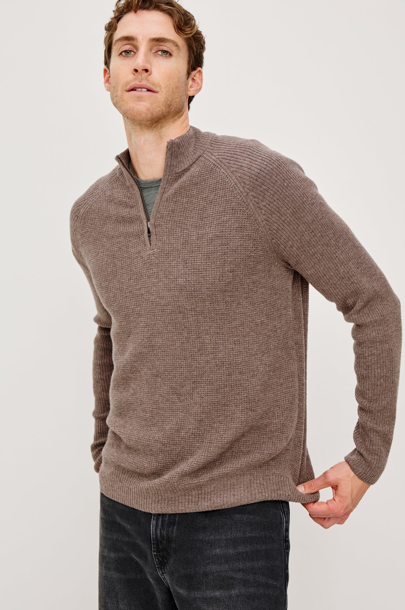 Stark long-sleeve quarter zip features a mock neck, waffle torso, and ribbed sleeves in Brown Melange colorway. Front View Featured on Model