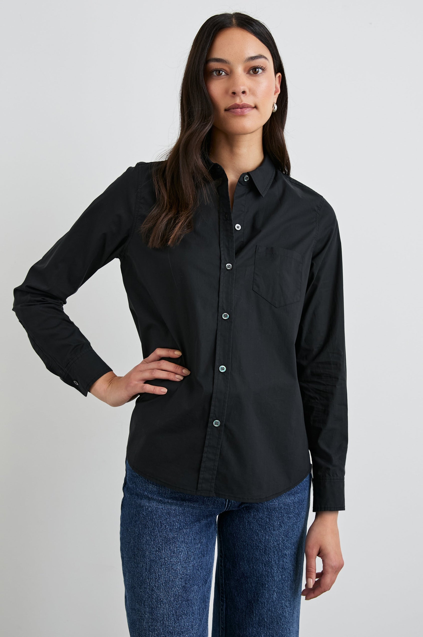 Stina Long-Sleeve Button Up with a Chest Patch Pocket in Black Colorway - Front View Featured on Model