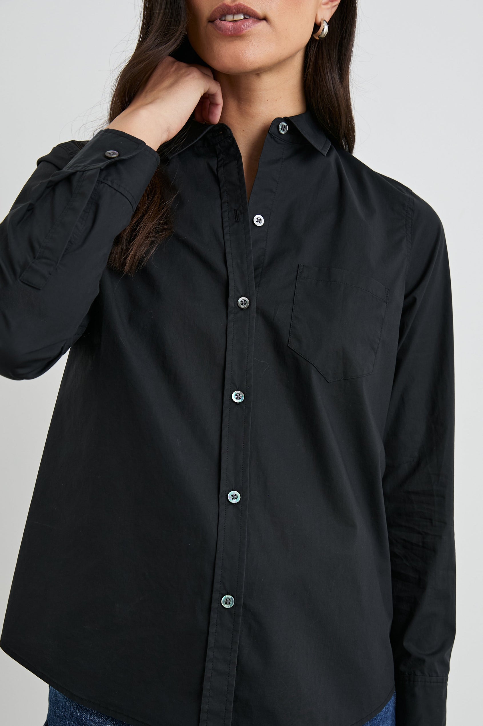 Stina Long-Sleeve Button Up with a Chest Patch Pocket in Black Colorway - Front View Featured on Model