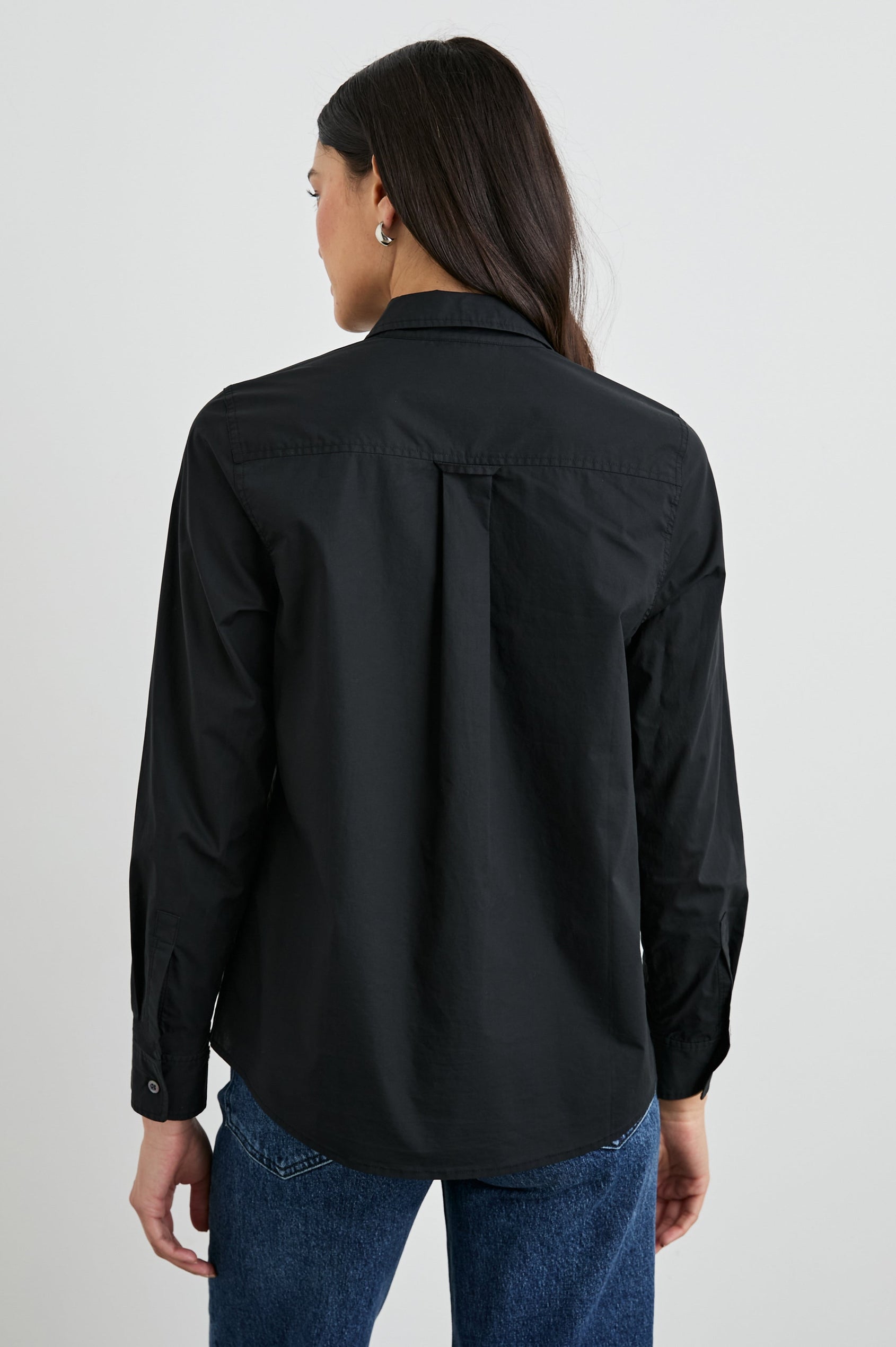 Stina Long-Sleeve Button Up with a Chest Patch Pocket in Black Colorway - Back View Featured on Model