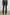 Sunset Crop Slim Fare Jeans with Belt Loops, Two Front Pockets plus a Coin Pocket and Two Back Patch Pockets in Black Pearl Colorway - Back View Featured on Model