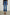 Sunset Crop Slim Fare Jeans with Belt Loops, Two Front Pockets plus a Coin Pocket and Two Back Patch Pockets in Tidal Wave Colorway - Front View Featured on Model