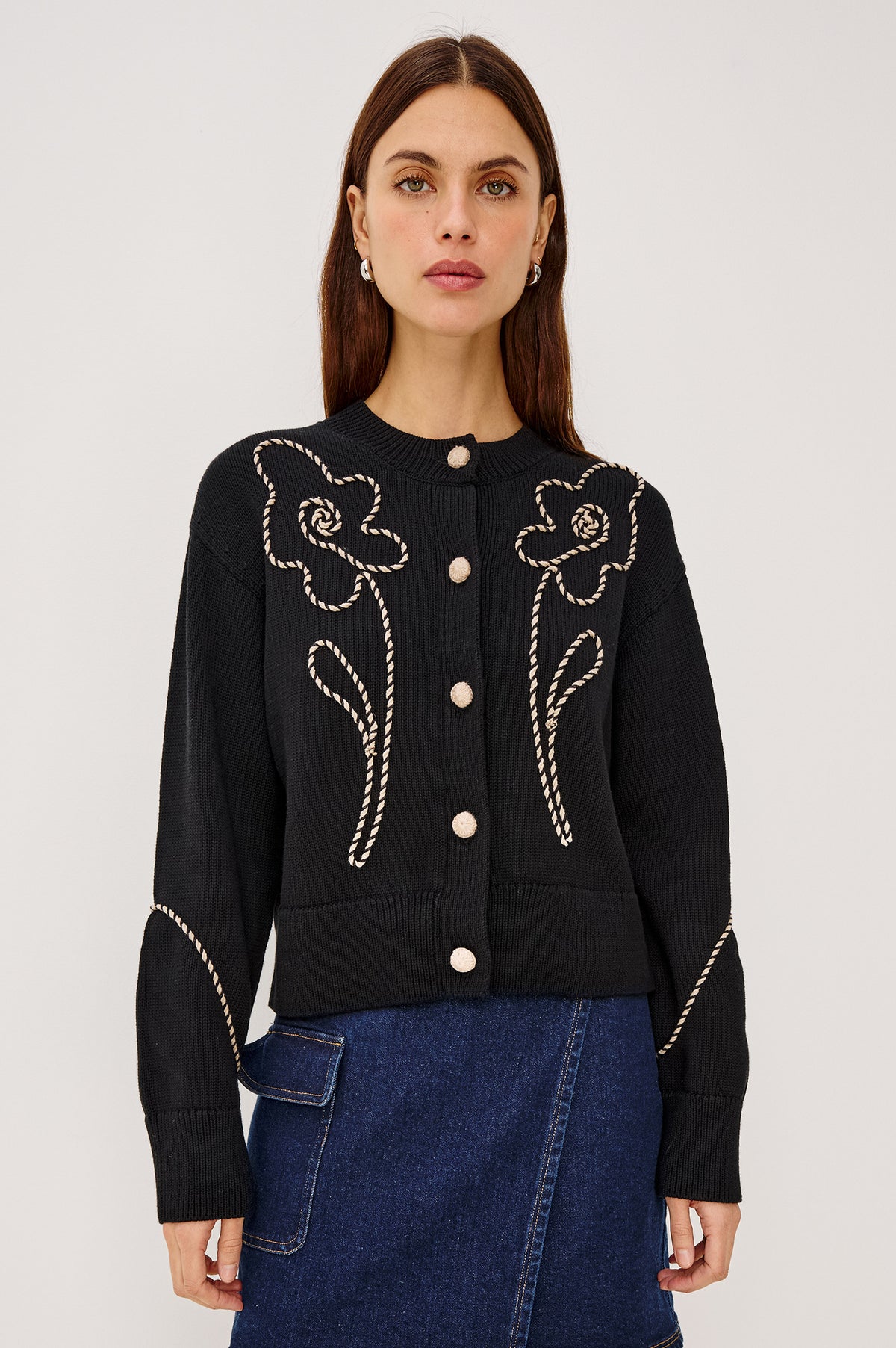 Sybil Cardigan in Cotton Knit With Boxy Fit, Crew Neckline, Soutache Embroidered Florals, Crochet Front Buttons, and Long Sleeves in Western Floral Colorway - Upper Body Front View Featured on Model