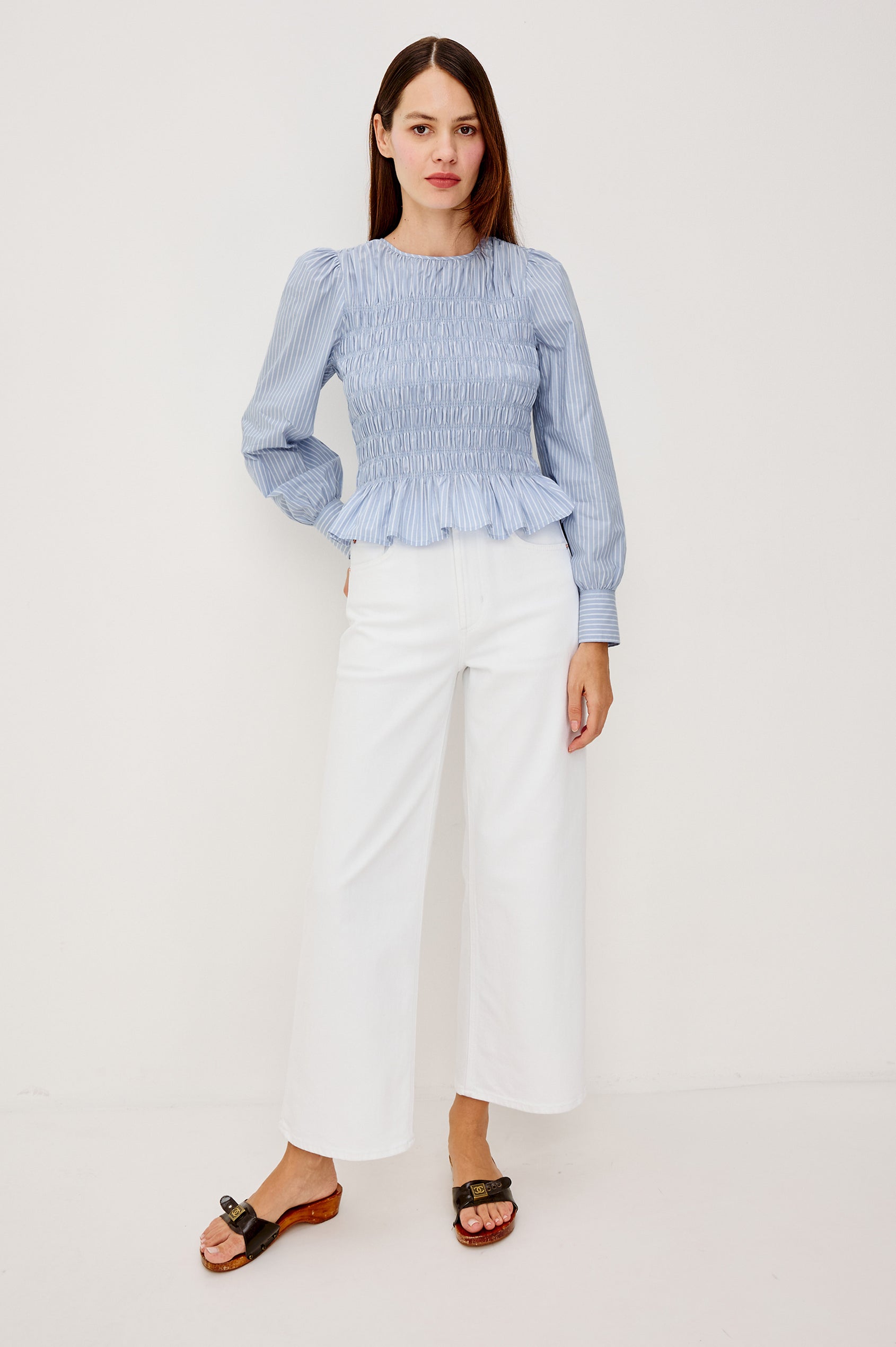 Tabi Blouse Top in Poplin With Smocked Body Long Puff Sleeves With Fitted Cuffs Contrast Embroidered Detailing and Back Keyhole Cutout in White Stripe Colorway - Upper Body Front View Featured on Model