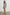Teddy Shorts with a Drawstring Waist, Two Front Pockets and one Back Patch Pocket in Sailor Stripe Terry Towel Stripe Colorway, Horizontal Tan and Navy Stripes - Front Full Body View Featured on Model