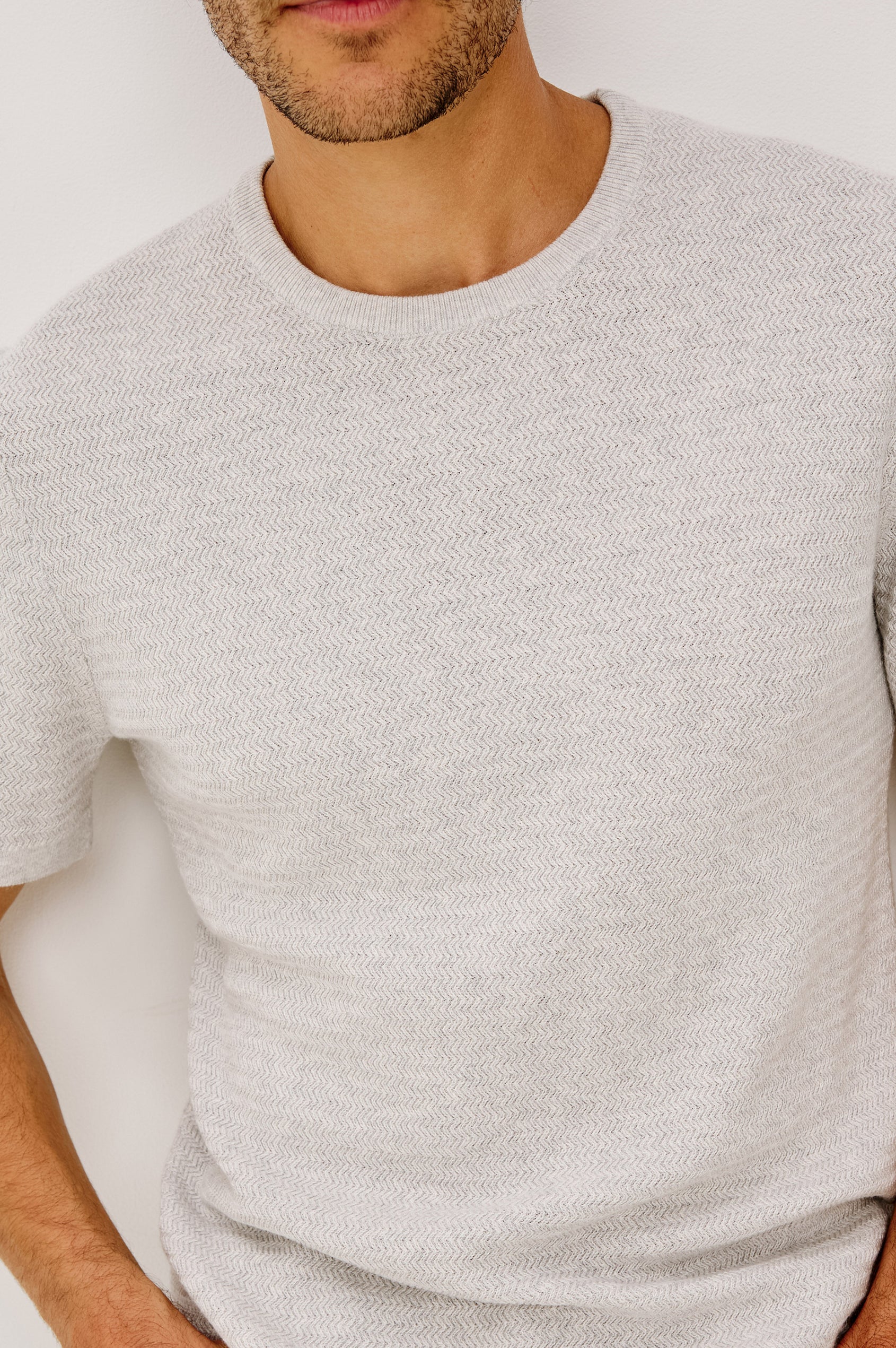 Theo Sweater in Cotton-Cashmere Blend With Short Sleeves, Crew Neckline, and Classic Fit in Heather Grey Colorway - Upper Body Close-Up Front View Featured on Model
