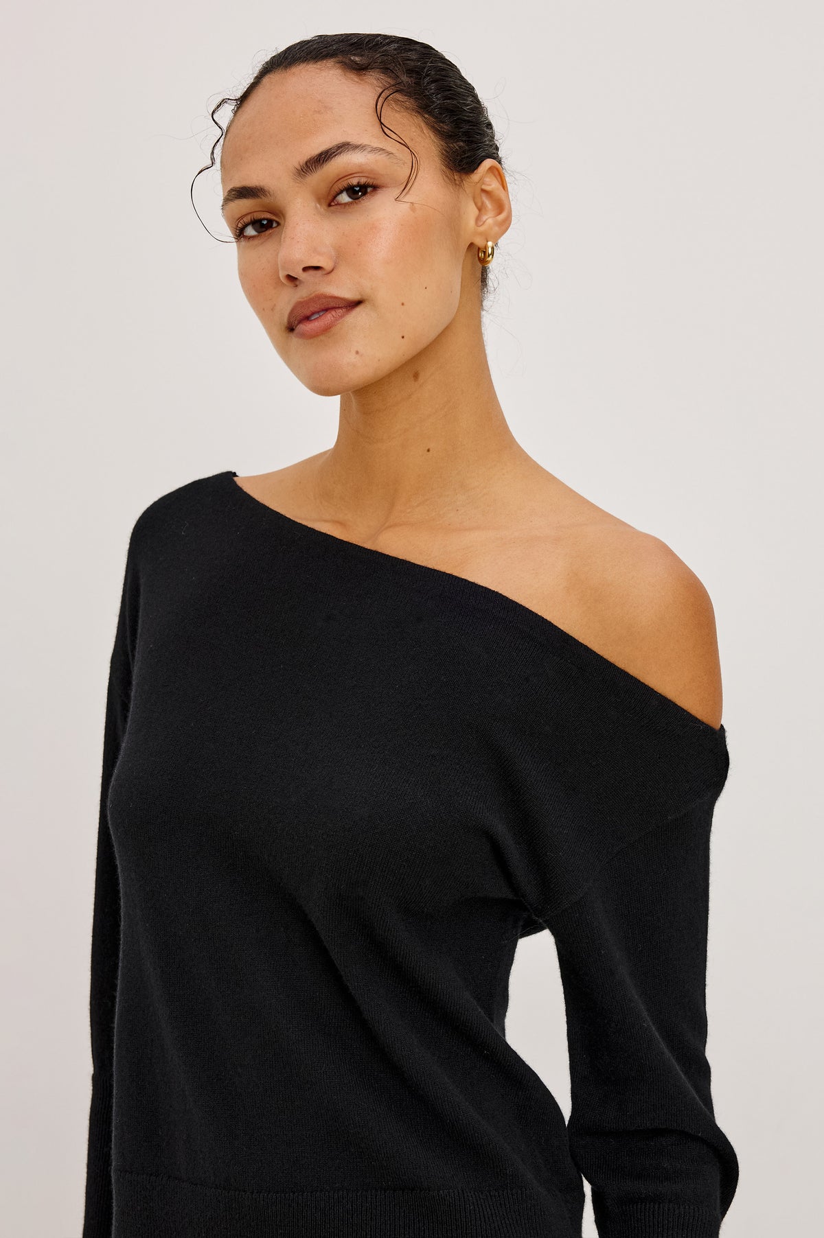 Tianna Sweater in Wool Blend With Off-Shoulder Neckline and Long Sleeves in Heather Charcoal Colorway - Front View Featured on Model.