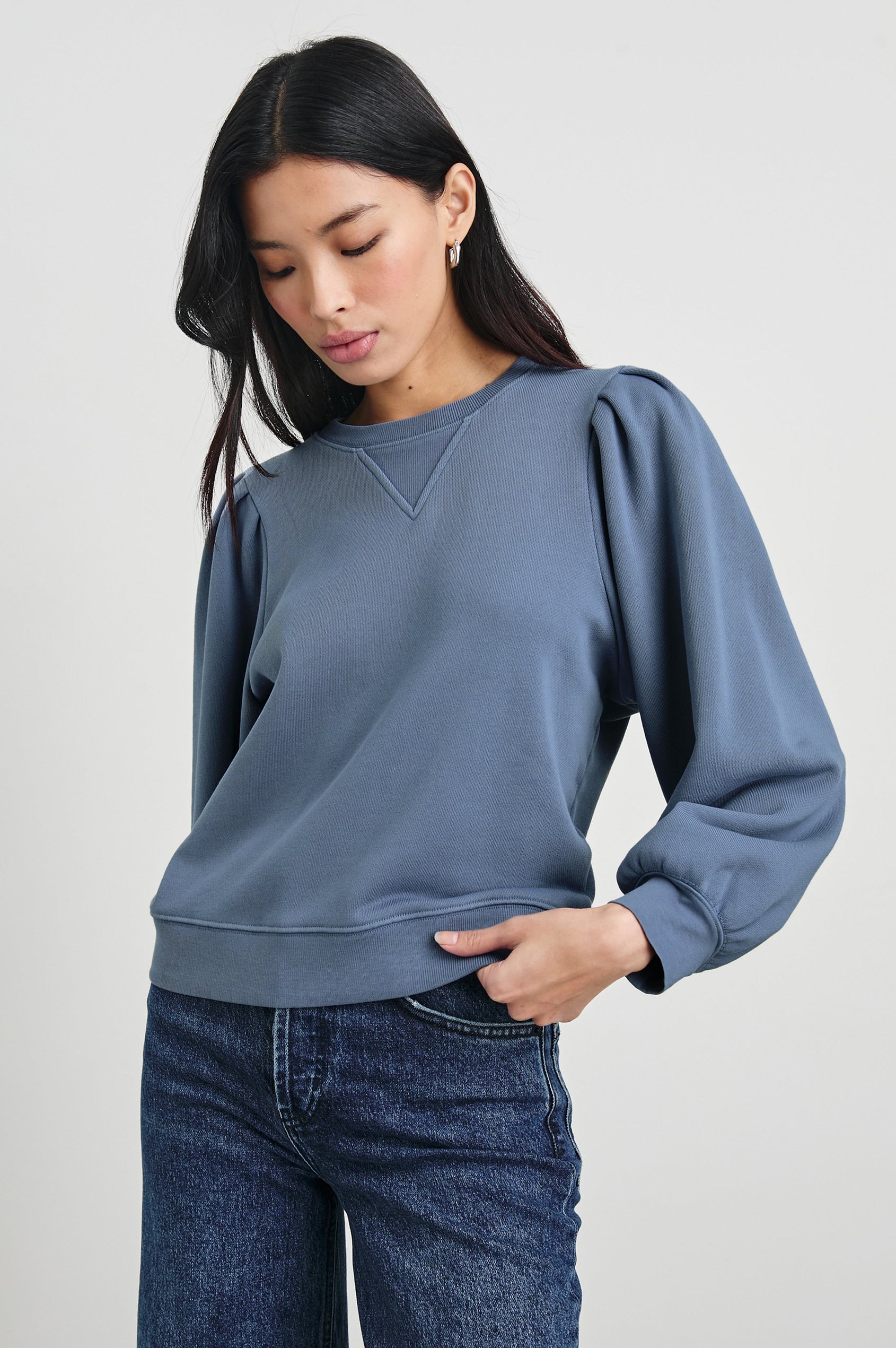 Tiffany Long-Sleeve Sweatshirt with a Crew Neck and Deep Pleated Sleeves in Faded Periwinkle Colorway - Front View Featured on Model