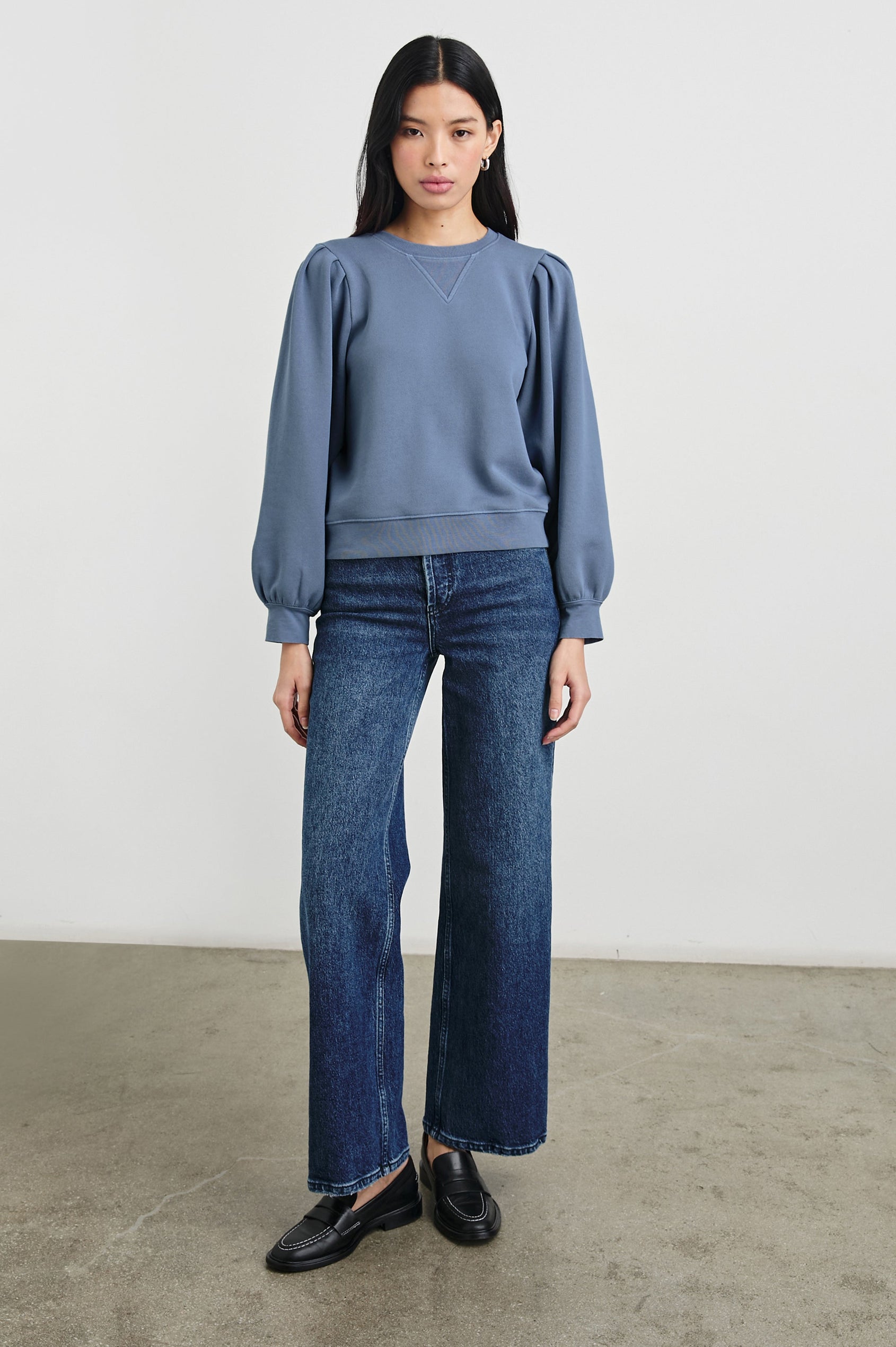 Tiffany Long-Sleeve Sweatshirt with a Crew Neck and Deep Pleated Sleeves in Faded Periwinkle Colorway - Front Full Body View Featured on Model