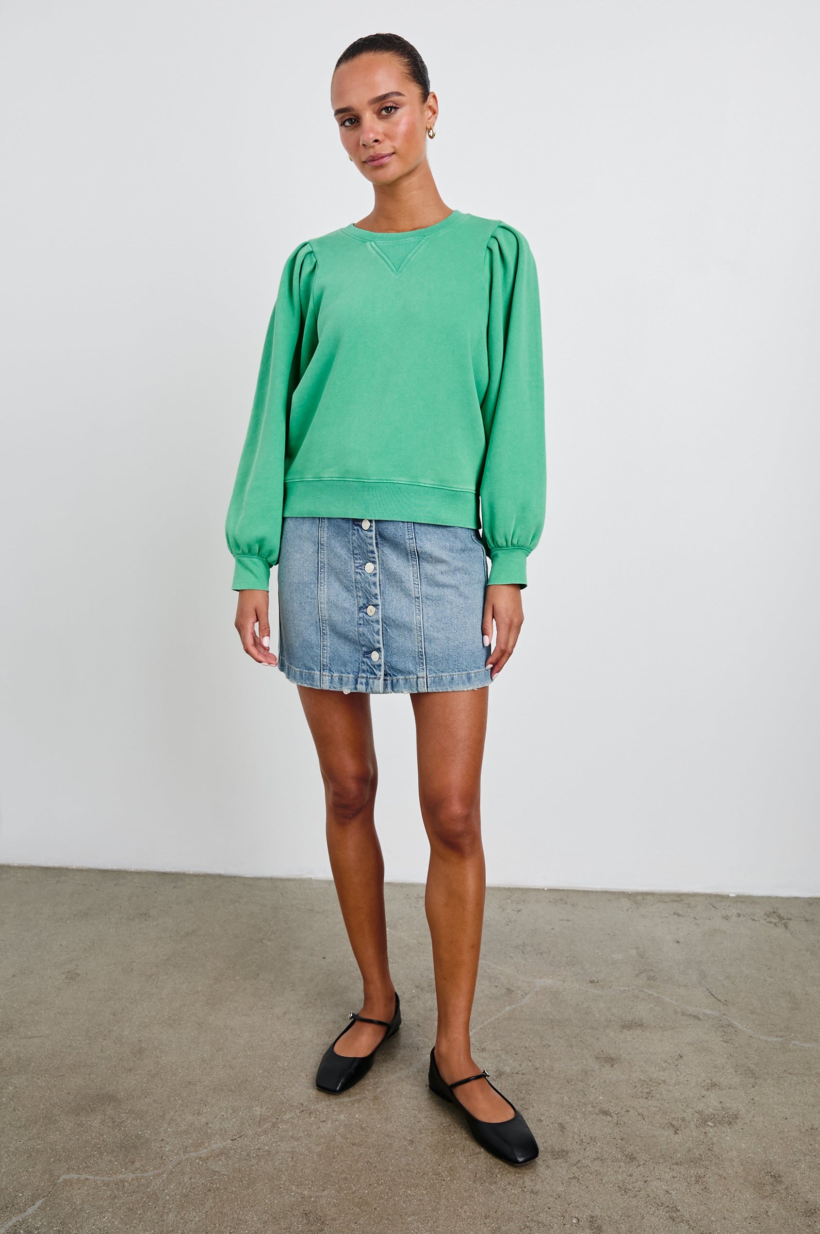Tiffany Long-Sleeve Sweatshirt with a Crew Neck and Deep Pleated Sleeves in Kelly Green Colorway - Front Full Body View Featured on Model