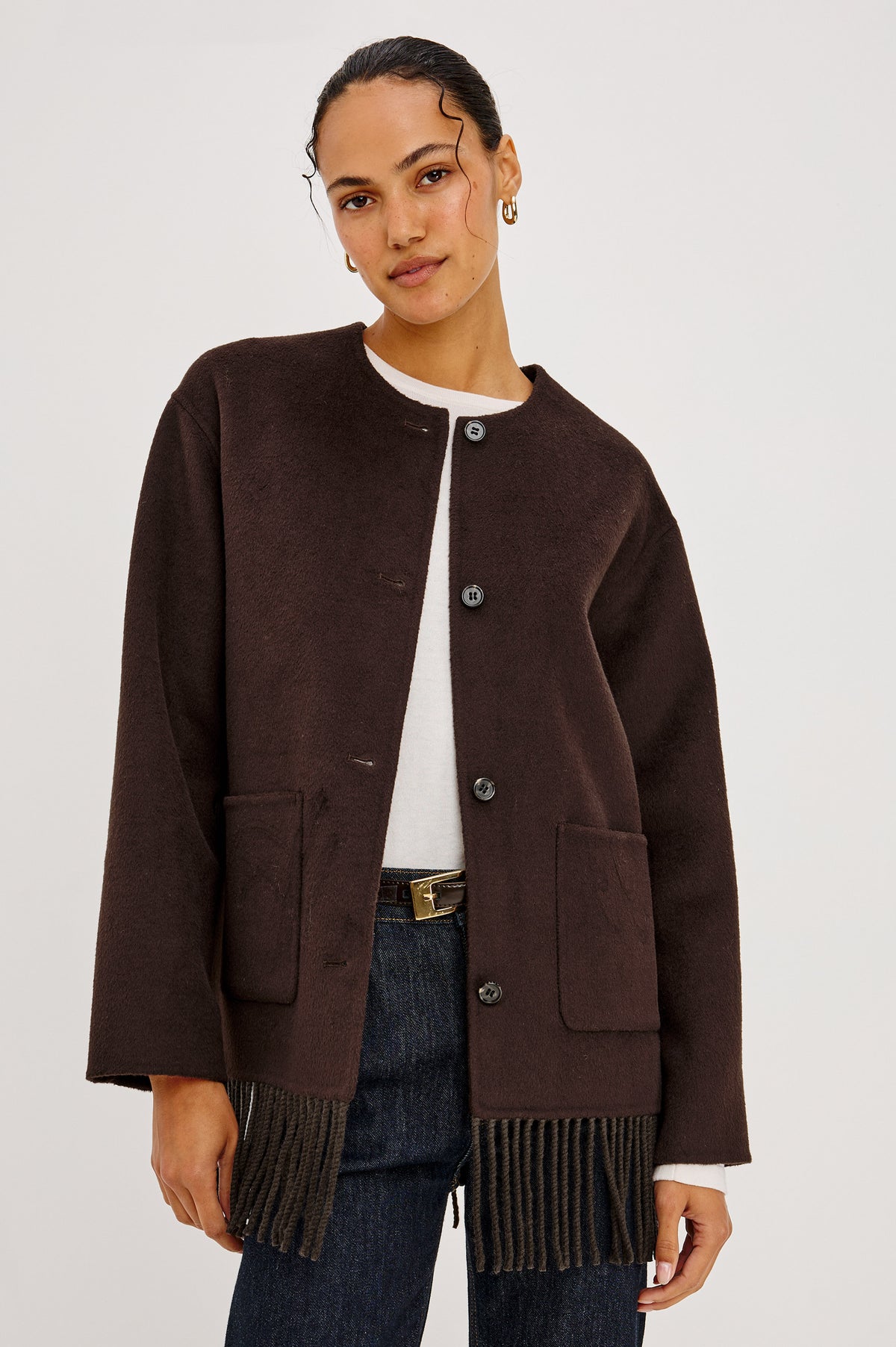 Tomoko Jacket in Heavy Wool Blend With Collarless Neckline, Front Buttons, Front Patch Pockets, and Fringe Hem in Chocolate Colorway - Front Crop Featured on Model.