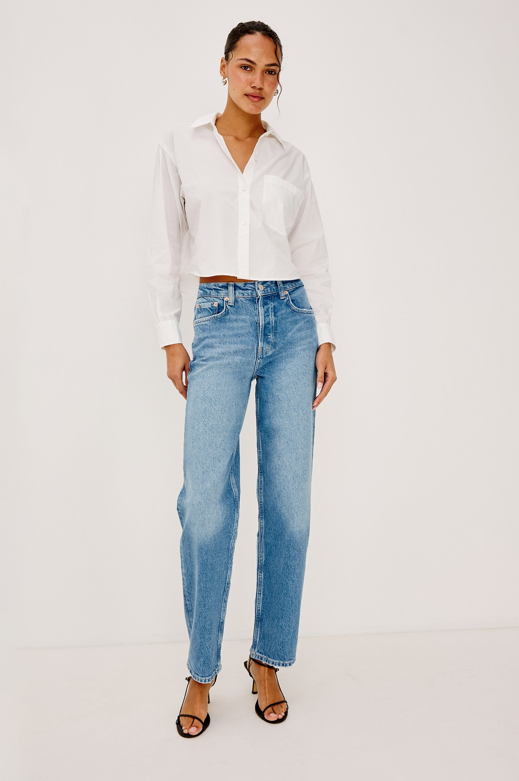 Topanga High-Rise Wide Straight Leg Jean in With 5-Pockets and a Front Zip-Fly in Baja Blue Colorway - Front View Featured on Model