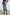 Topanga Crop Straight Jeans with an Asymmetrical Crop, Belt Loops, Two Front Pockets plus a Coin Pocket and Two Back Patch Pockets in Pure Indigo Colorway - Front View Featured on Model
