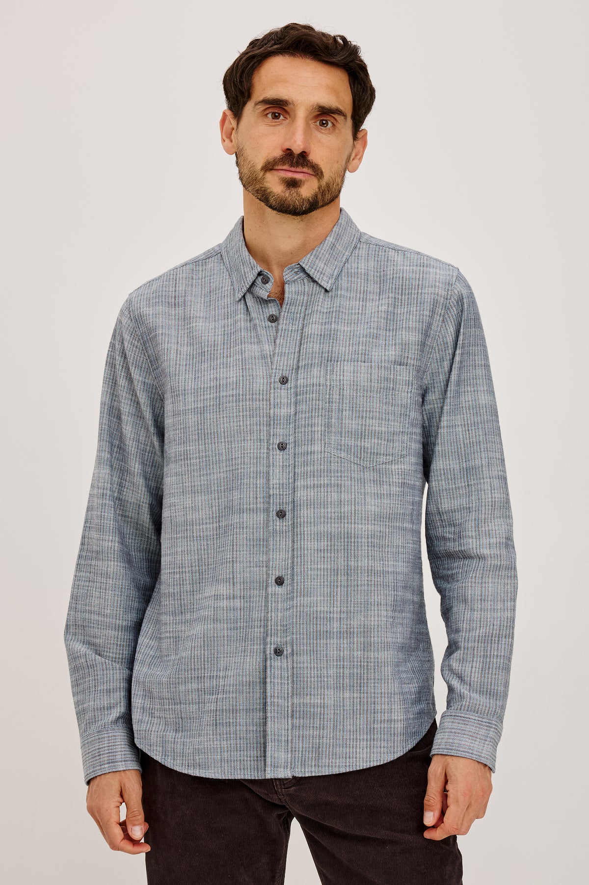Tristan Shirt in 100% Cotton With Rope-Dyed Washed Effect, Collar, Chest Patch Pocket, Front Button Closure, and Long Sleeves in Marine Kelp Stripe Colorway - Upper Body Front View Featured on Model