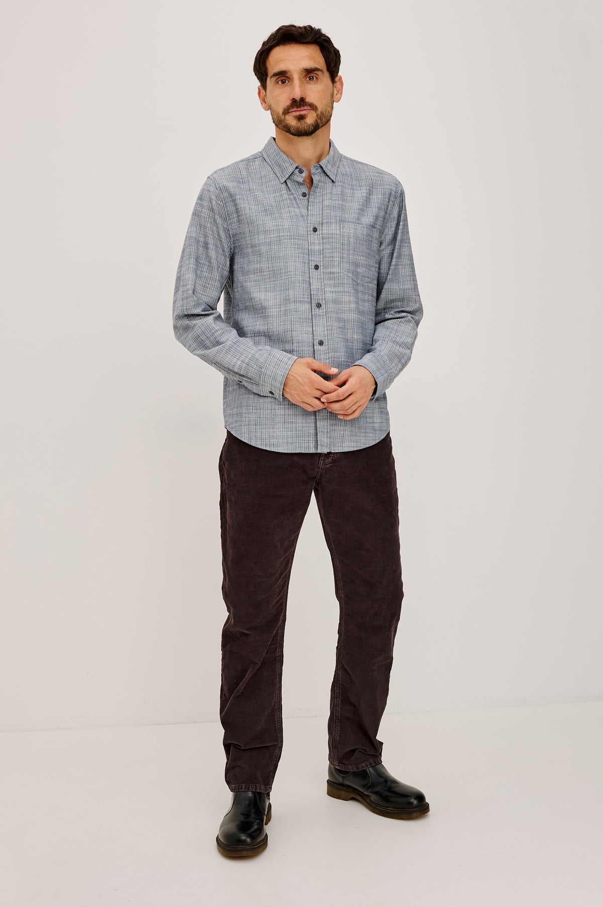 Tristan Shirt in 100% Cotton With Rope-Dyed Washed Effect, Collar, Chest Patch Pocket, Front Button Closure, and Long Sleeves in Marine Kelp Stripe Colorway - Full Body Front View Featured on Model