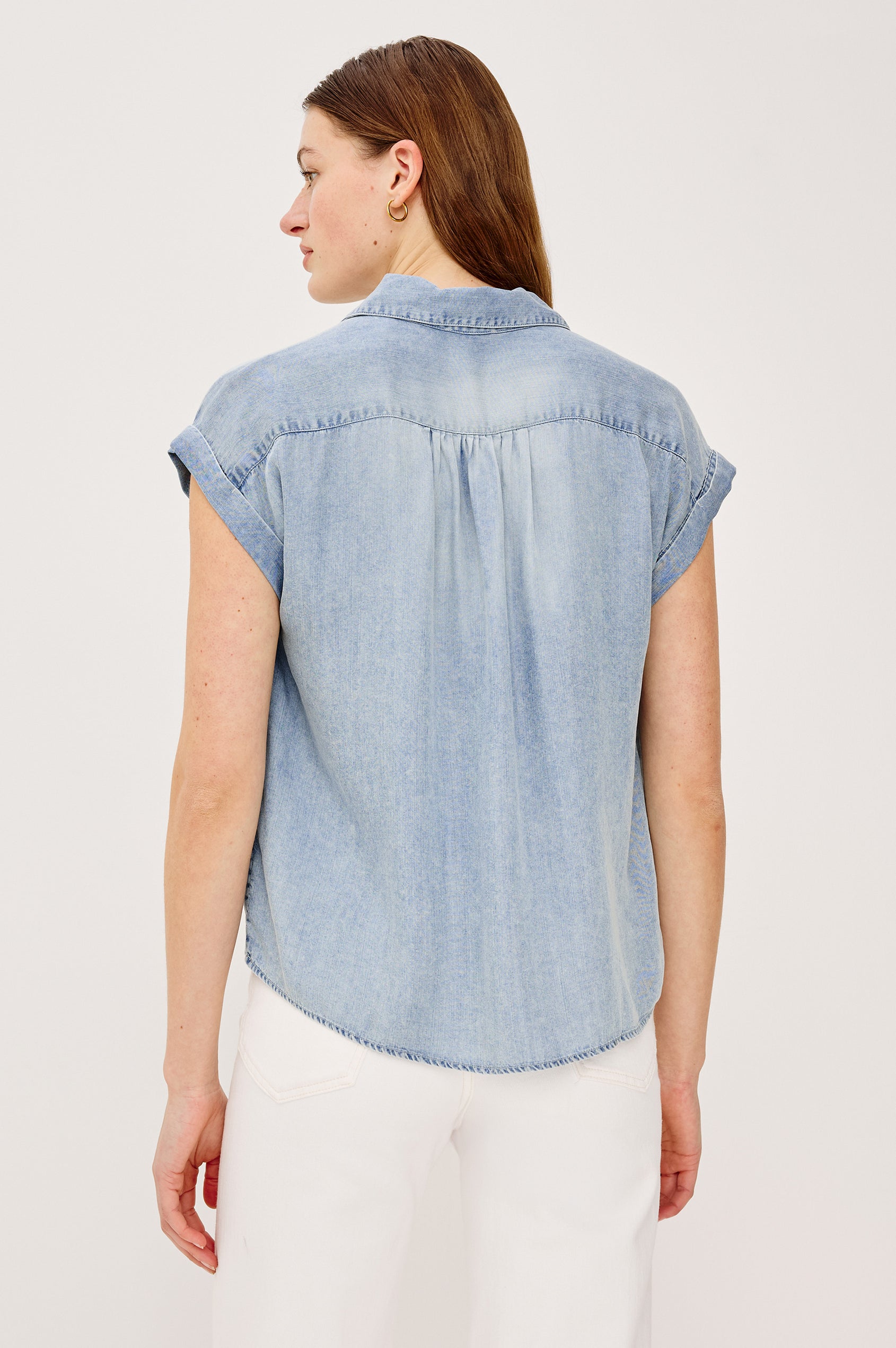 Tuscany Top in Luxe Linen With Relaxed Fit, Cuffed Cap Sleeves, Collar, Half Front Placket in Washed Blue Colorway - Upper Body Back View Featured on Model