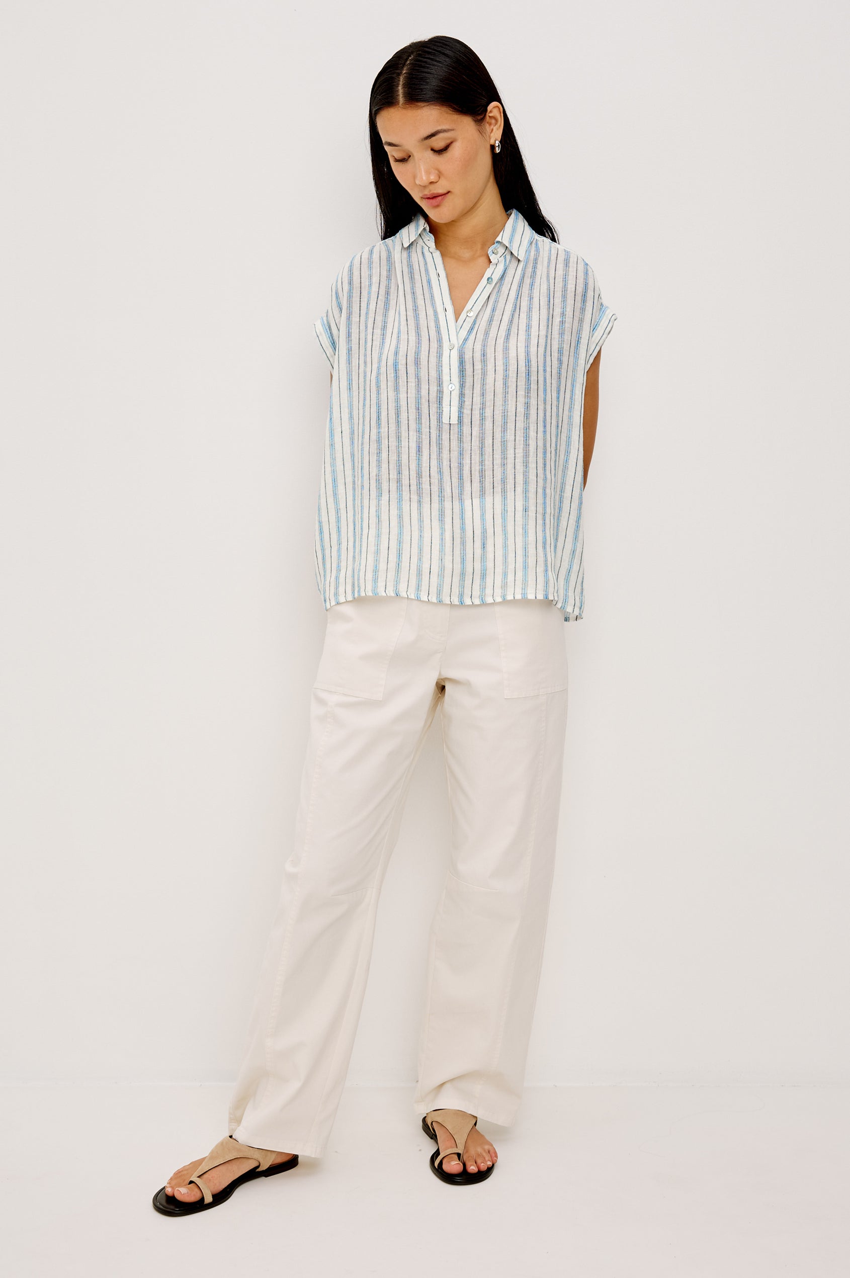 Tuscany Shirt in Linen With Collar, Front Half Placket, Capped Cuff Sleeves, and Relaxed Fit in Windward Stripe Colorway - Upper Body Front View Featured on Model