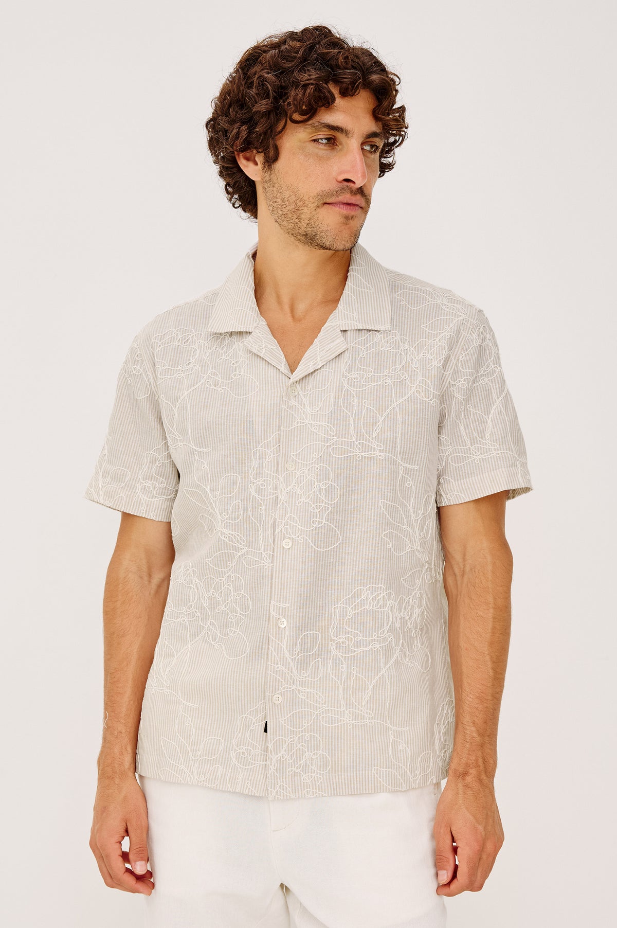 Tyler Camp Shirt in Stretch Cotton With Open Collar, Short Sleeves, and Classic Fit in Bouquet Khaki Stripe Colorway - Upper Body Front View Featured on Model