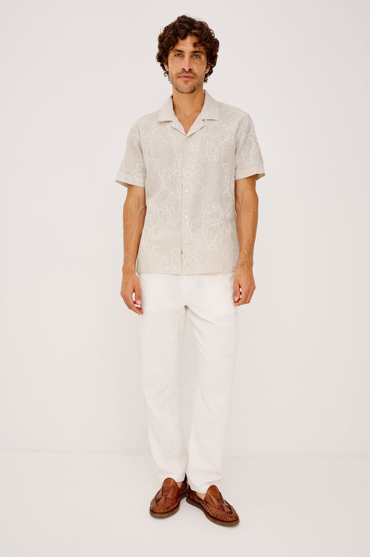Tyler Camp Shirt in Stretch Cotton With Open Collar, Short Sleeves, and Classic Fit in Bouquet Khaki Stripe Colorway - Full Body Front View Featured on Model