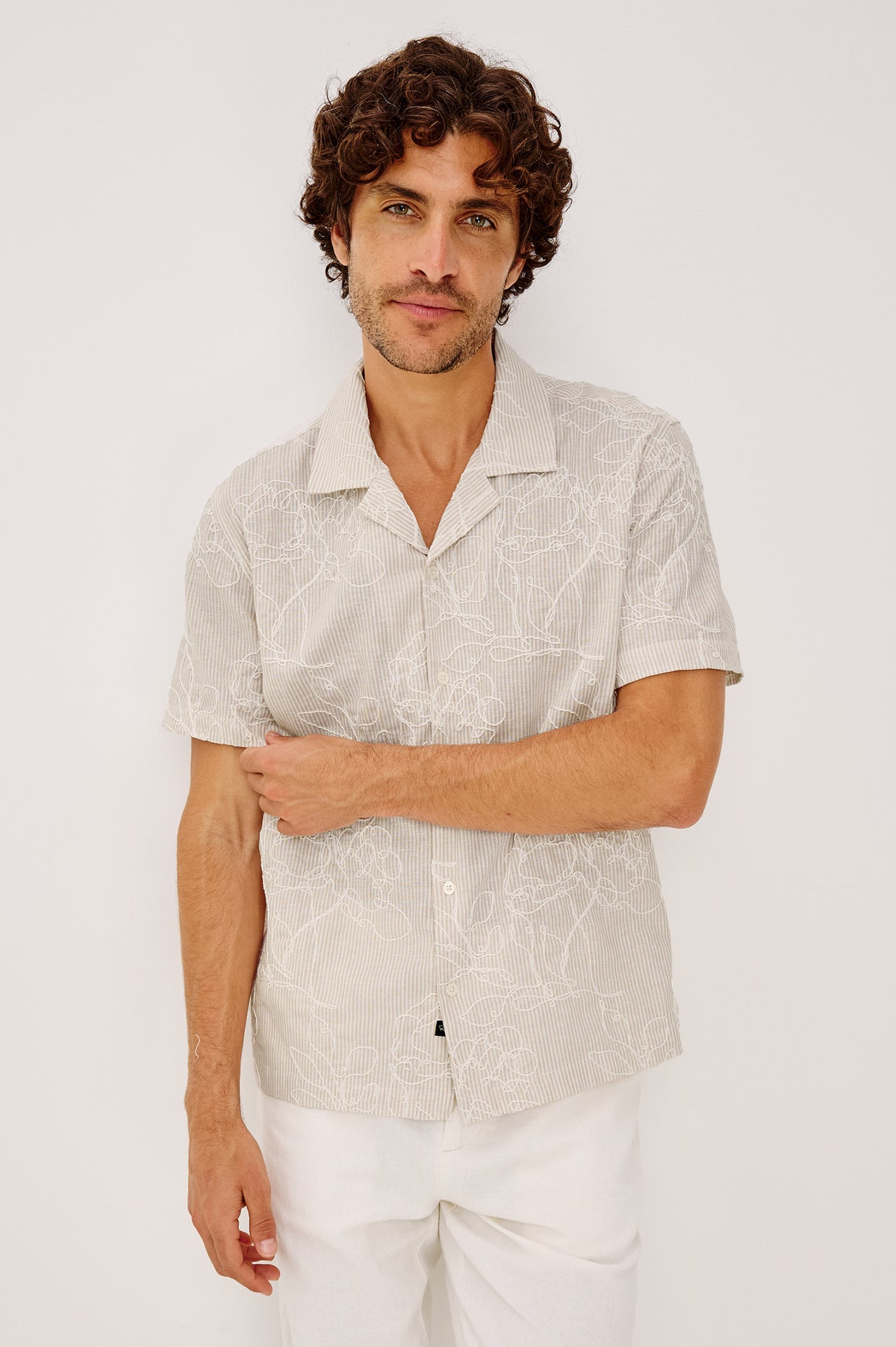 Tyler Camp Shirt in Stretch Cotton With Open Collar, Short Sleeves, and Classic Fit in Bouquet Khaki Stripe Colorway - Upper Body Front View Featured on Model
