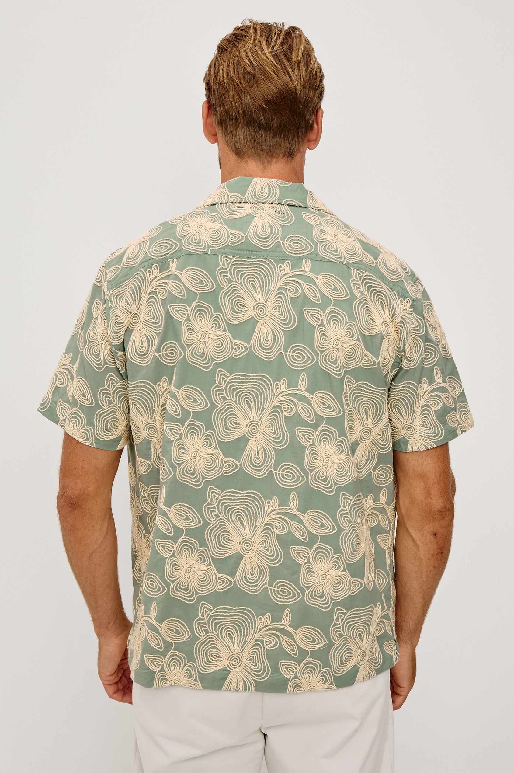 Tyler Shirt in Stretch Cotton With Floral Jute Embroidery, Front Buttons, Notched Collar, Short Sleeves, and Classic Fit in Floral Rope Jade Colorway - Upper Body Back View Featured on Model
