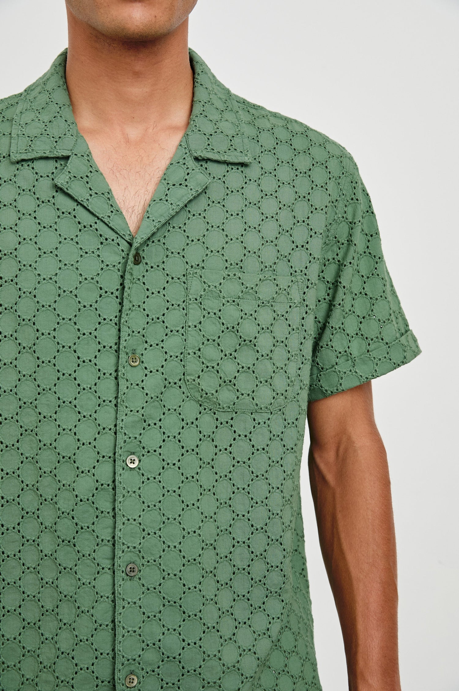 Tyler embroidered short sleeve button up with collar in Green Dots - close up of details on model