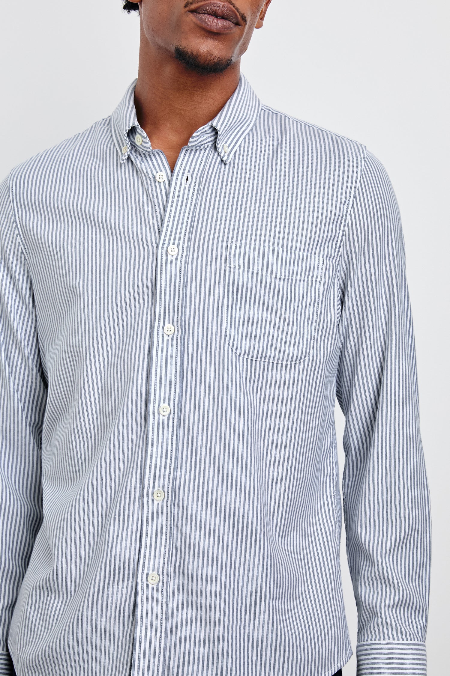 Vance Front Button Shirt in Cotton Blend With Collar, Long Sleeves, and Classic Fit in Blue White Stripe Colorway - Upper Body Front Detail View Featured on Model
