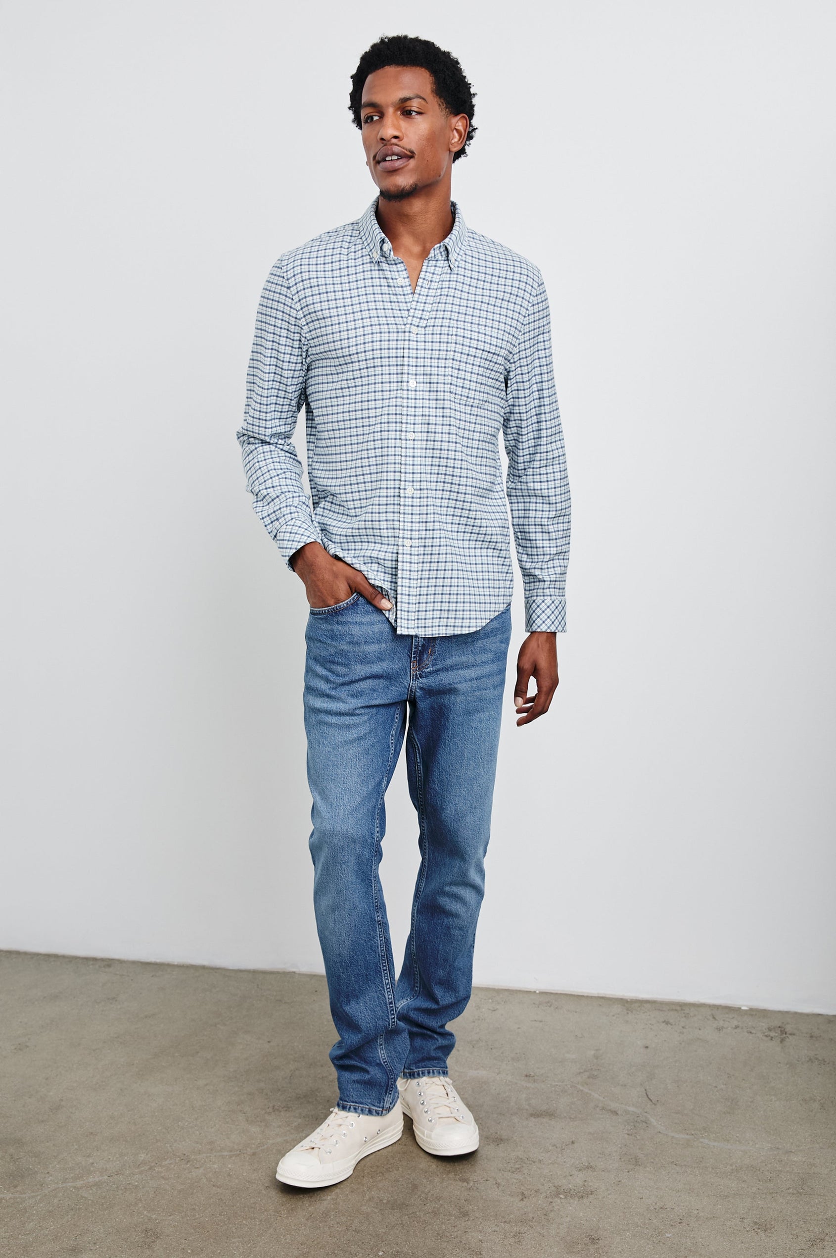 Vance Long-Sleeve Button Up with a Chest Patch Pocket in Stellar Navy Check Colorway, a plaid in white and blues - Front Full Body View Featured on Model