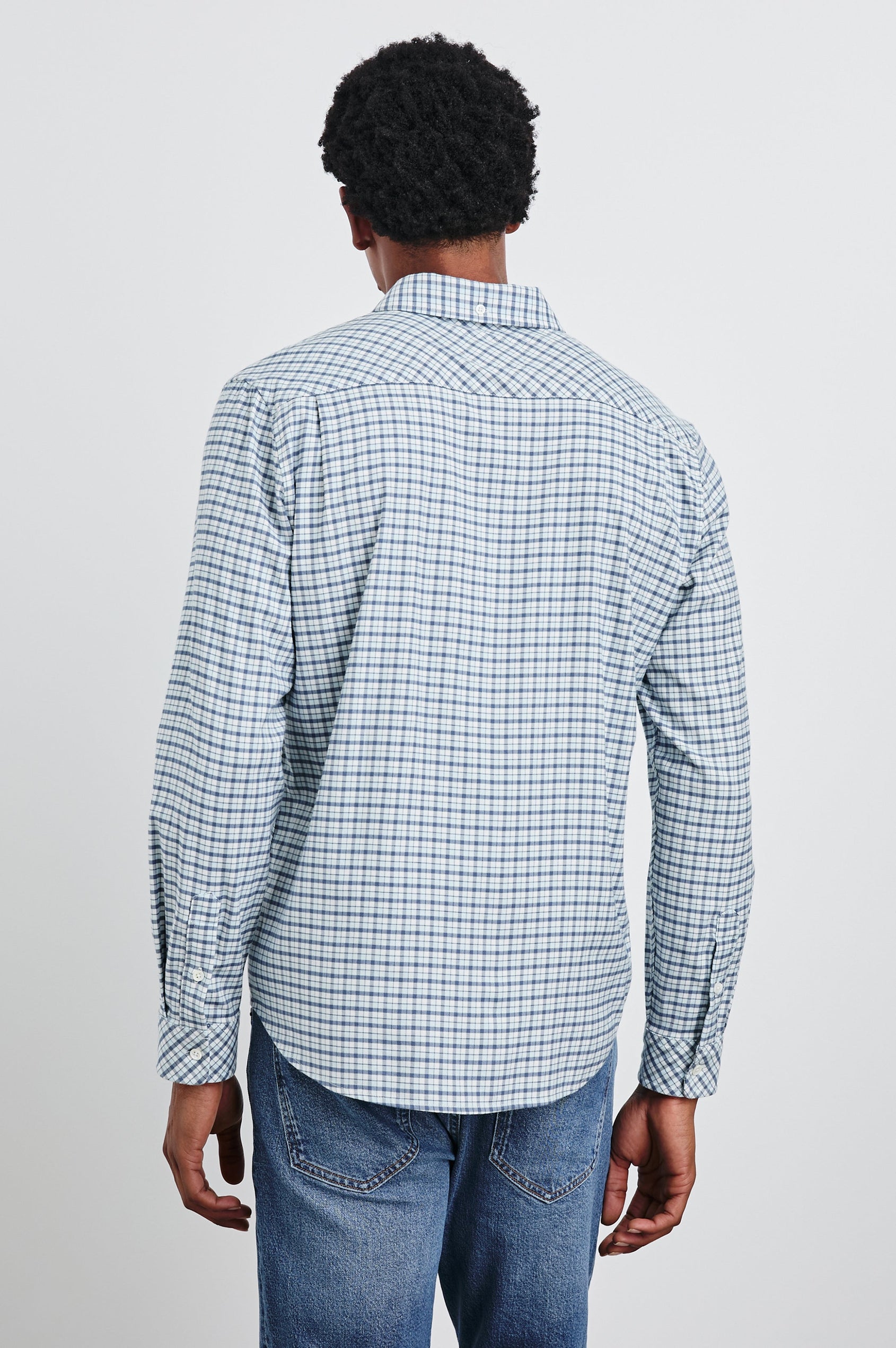 Vance Long-Sleeve Button Up with a Chest Patch Pocket in Stellar Navy Check Colorway, a plaid in white and blues - Back View Featured on Model