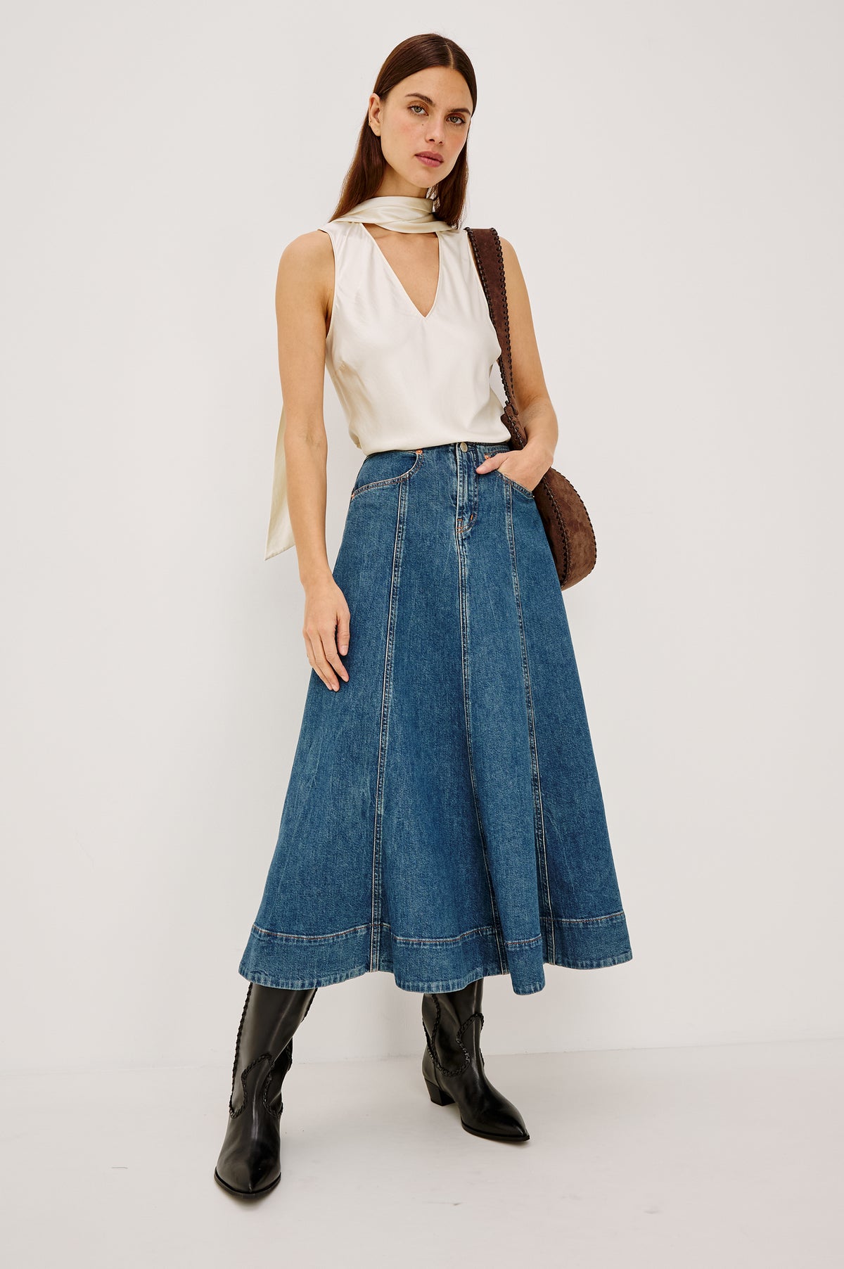 Vicente Midi Skirt in Comfort-Stretch Denim With High-Waisted Fit, Back Yoke, Side Pockets, No Waistband in Meadowbrook Colorway - Full Body Front View Featured on Model.